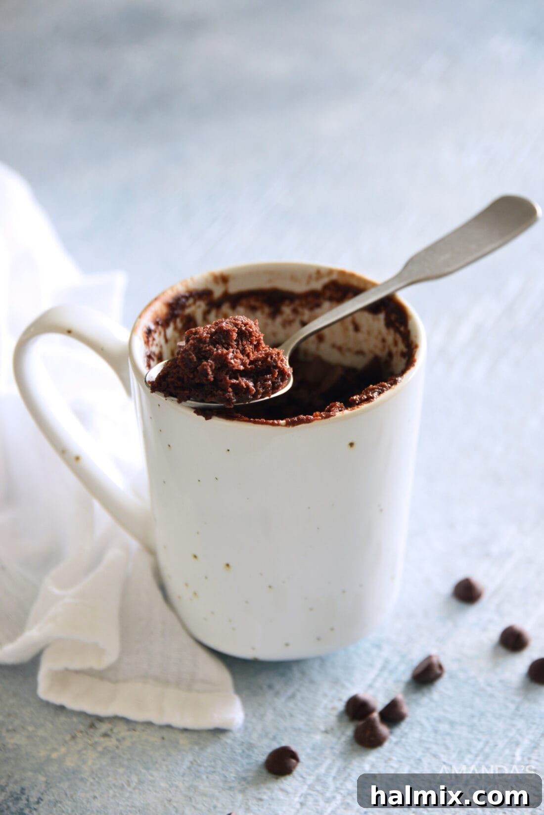 Rich chocolate cake in a microwave-safe mug, ready to be enjoyed as a single-serving dessert.