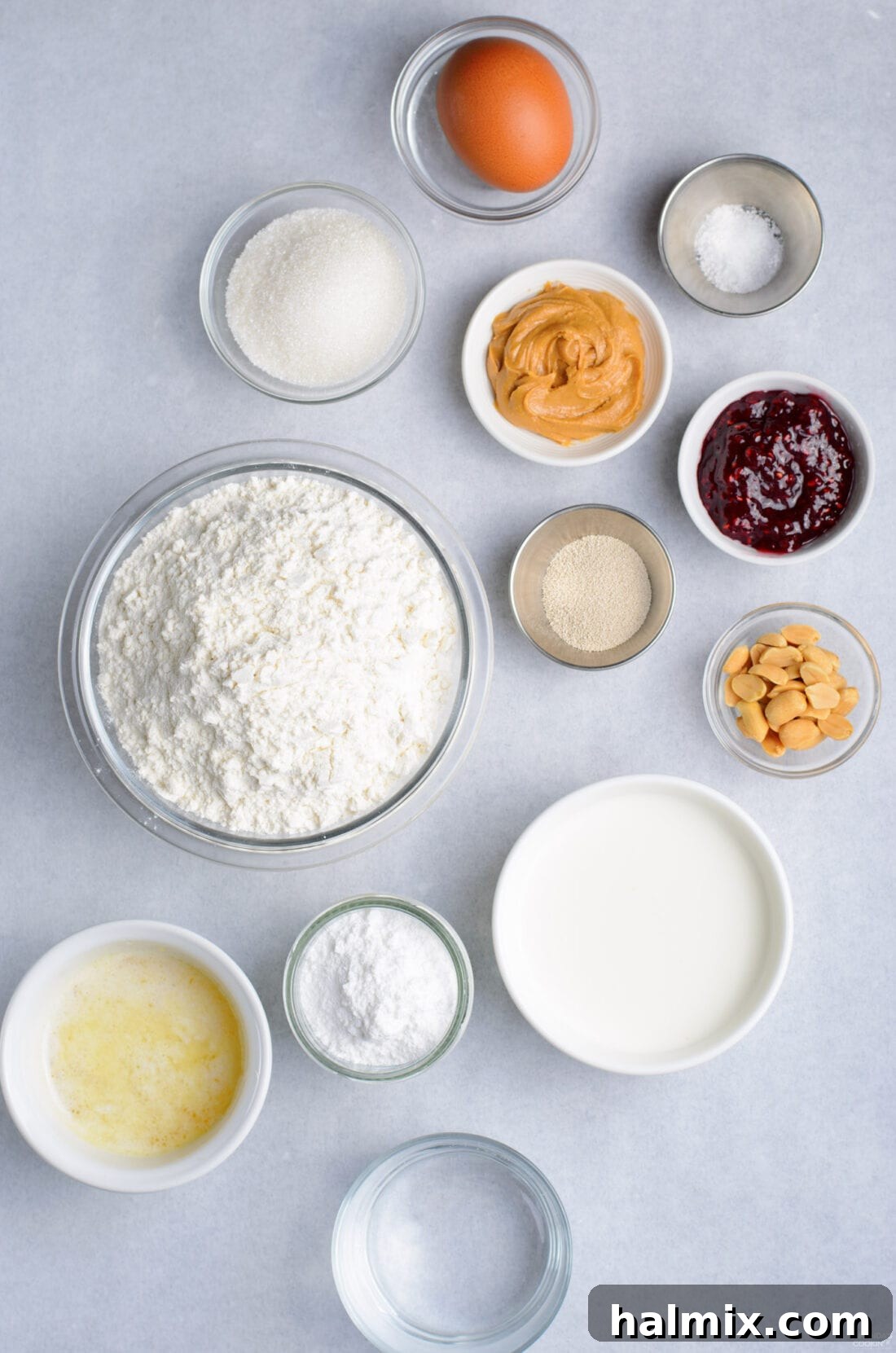 A visual display of all the ingredients laid out on a counter, ready for making donuts.