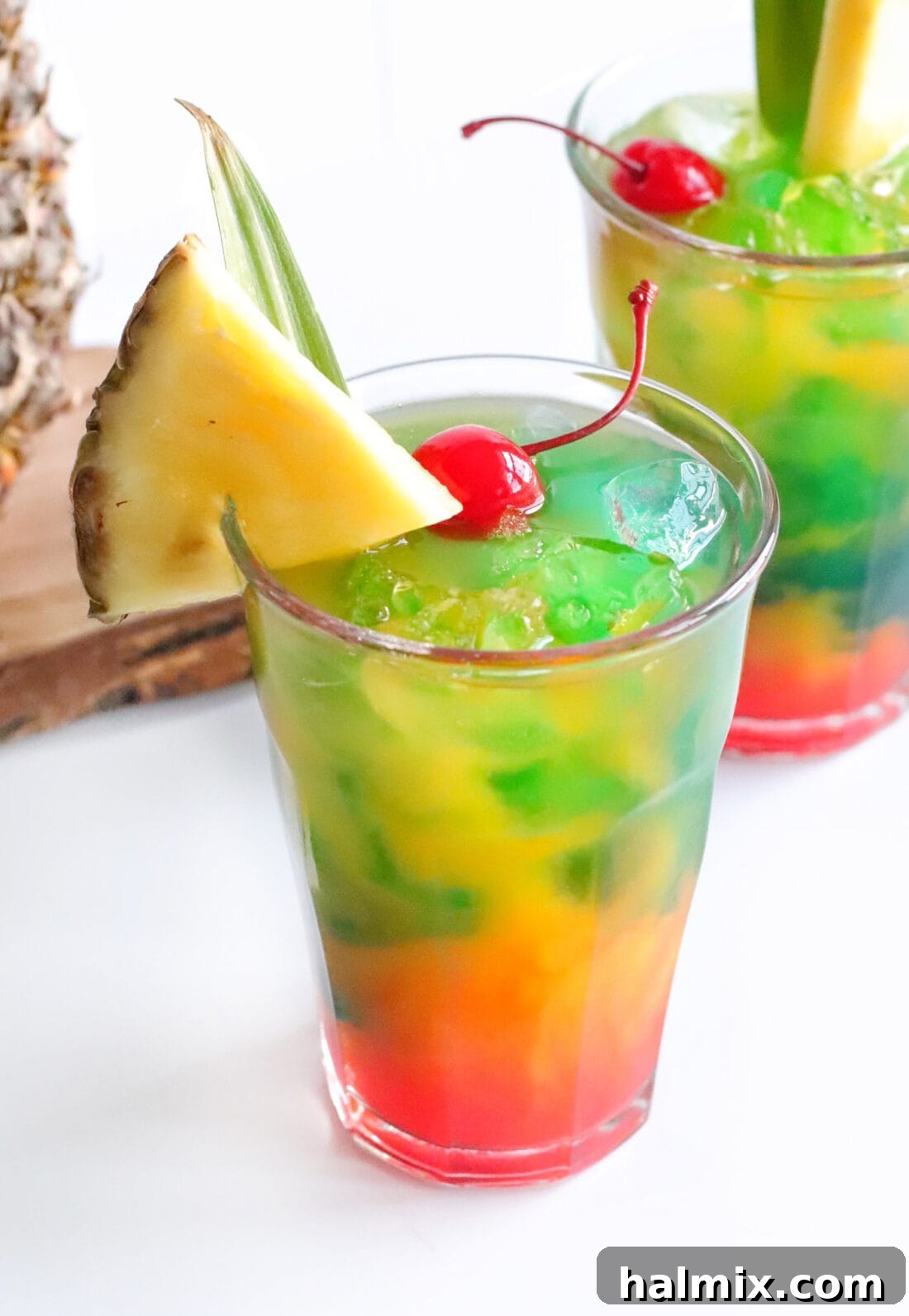 Blue Hawaiian Mai Tai garnished with a pineapple wedge and cherry, evoking a sense of tropical bliss.