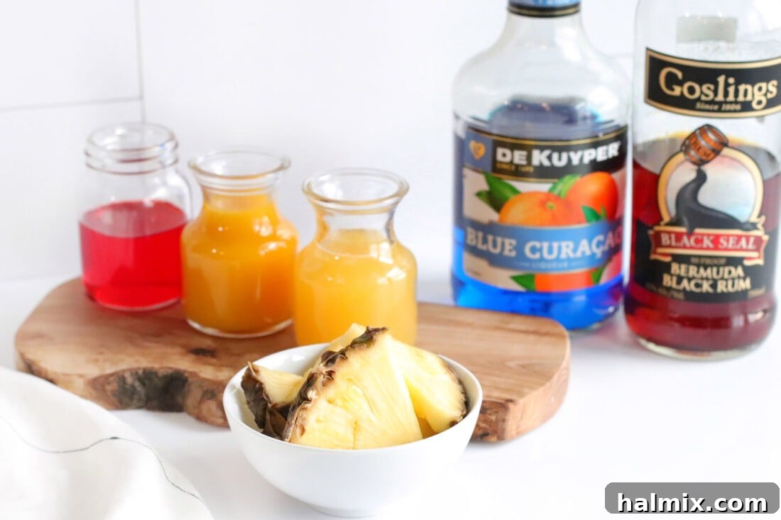 Ingredients for Blue Hawaiian Mai Tai laid out on a table, including juices, rum, and liqueurs.