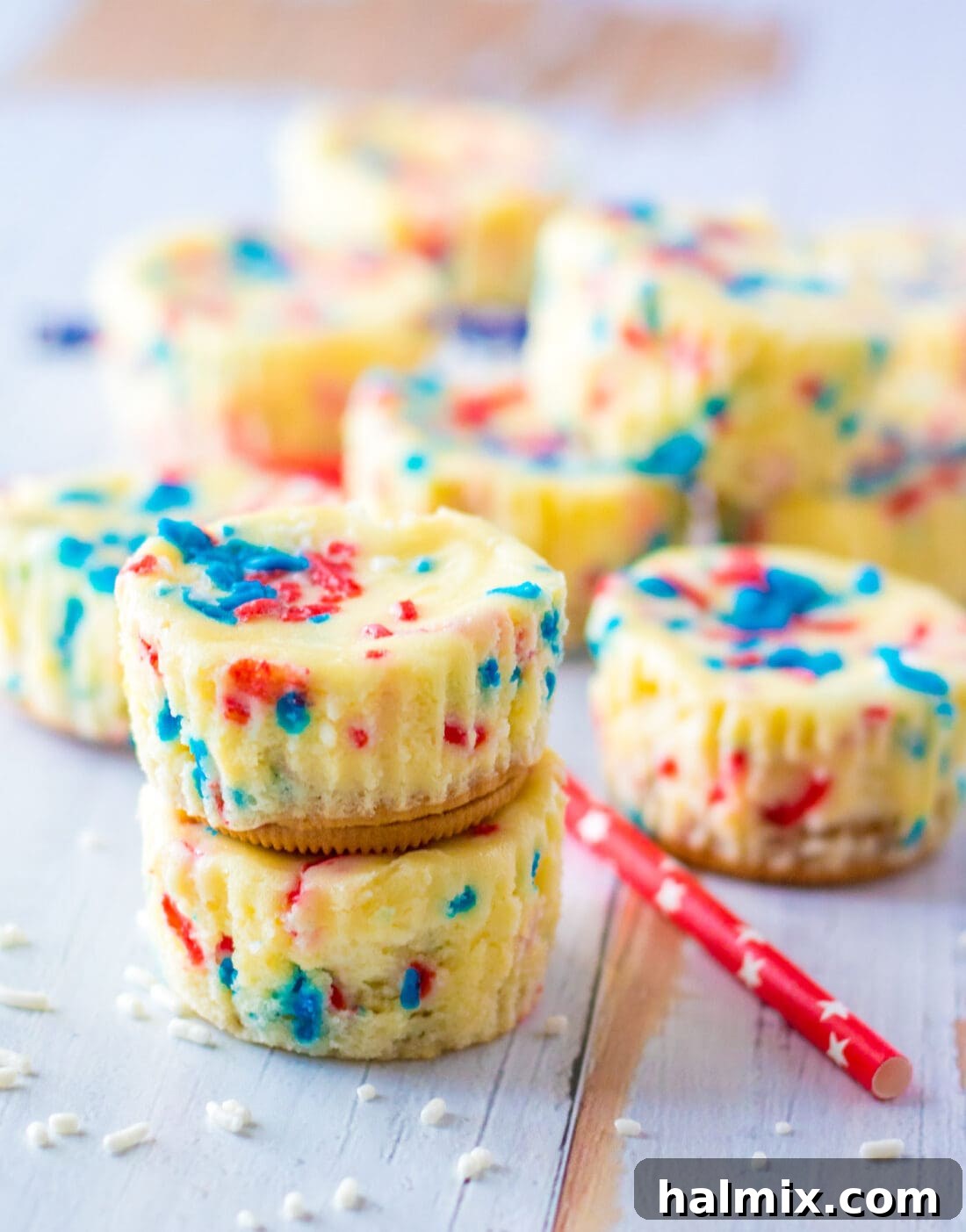 Stack of Patriotic Mini Cheesecakes with more behind