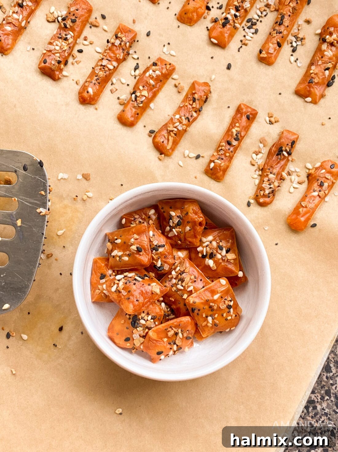 Bowl of crispy keto baked cheese crackers, ready to be enjoyed as a low-carb snack.