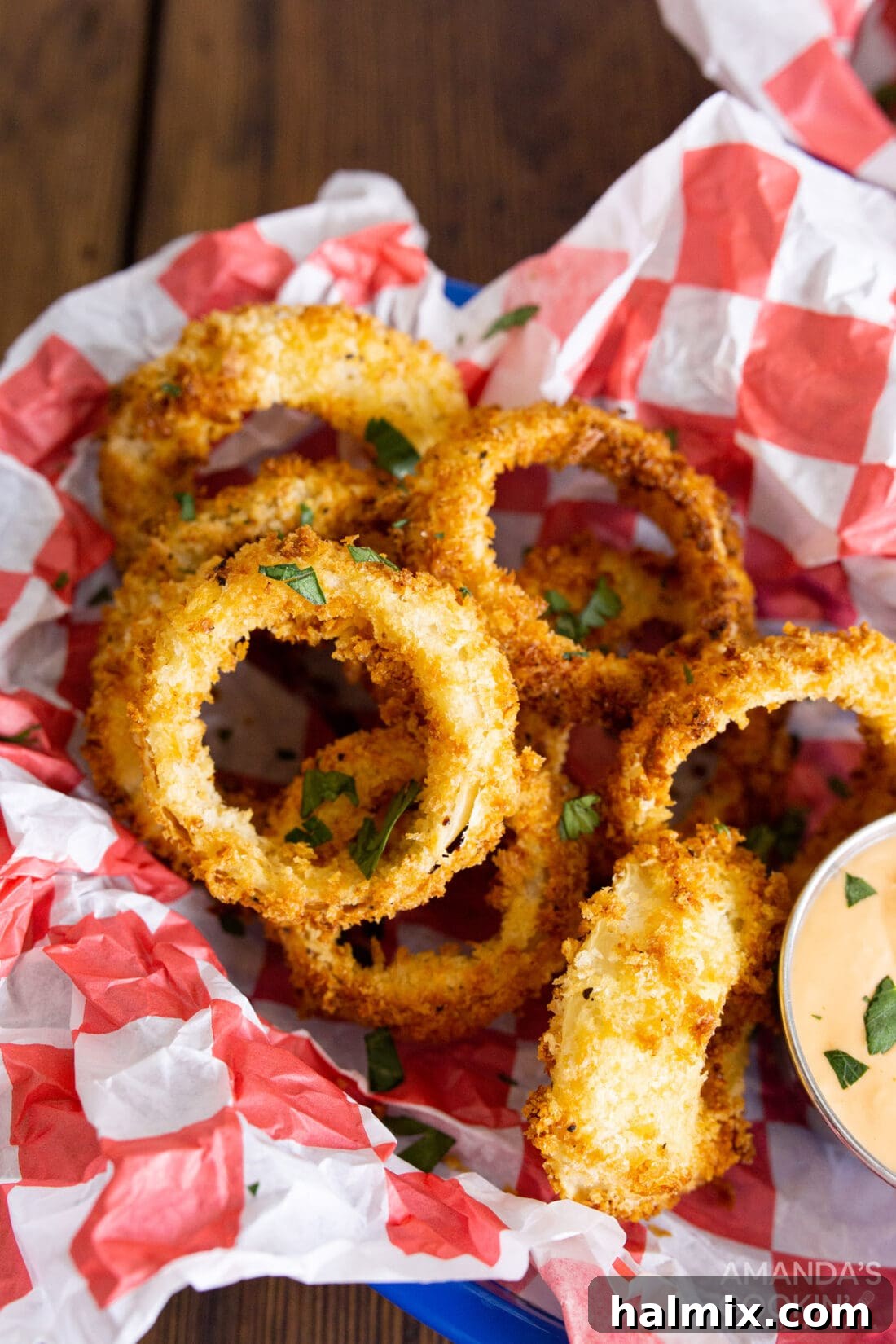 Golden Air-Fried Onion Rings 2 Air Fryer Onion Rings in a basket, golden brown and perfectly crispy.