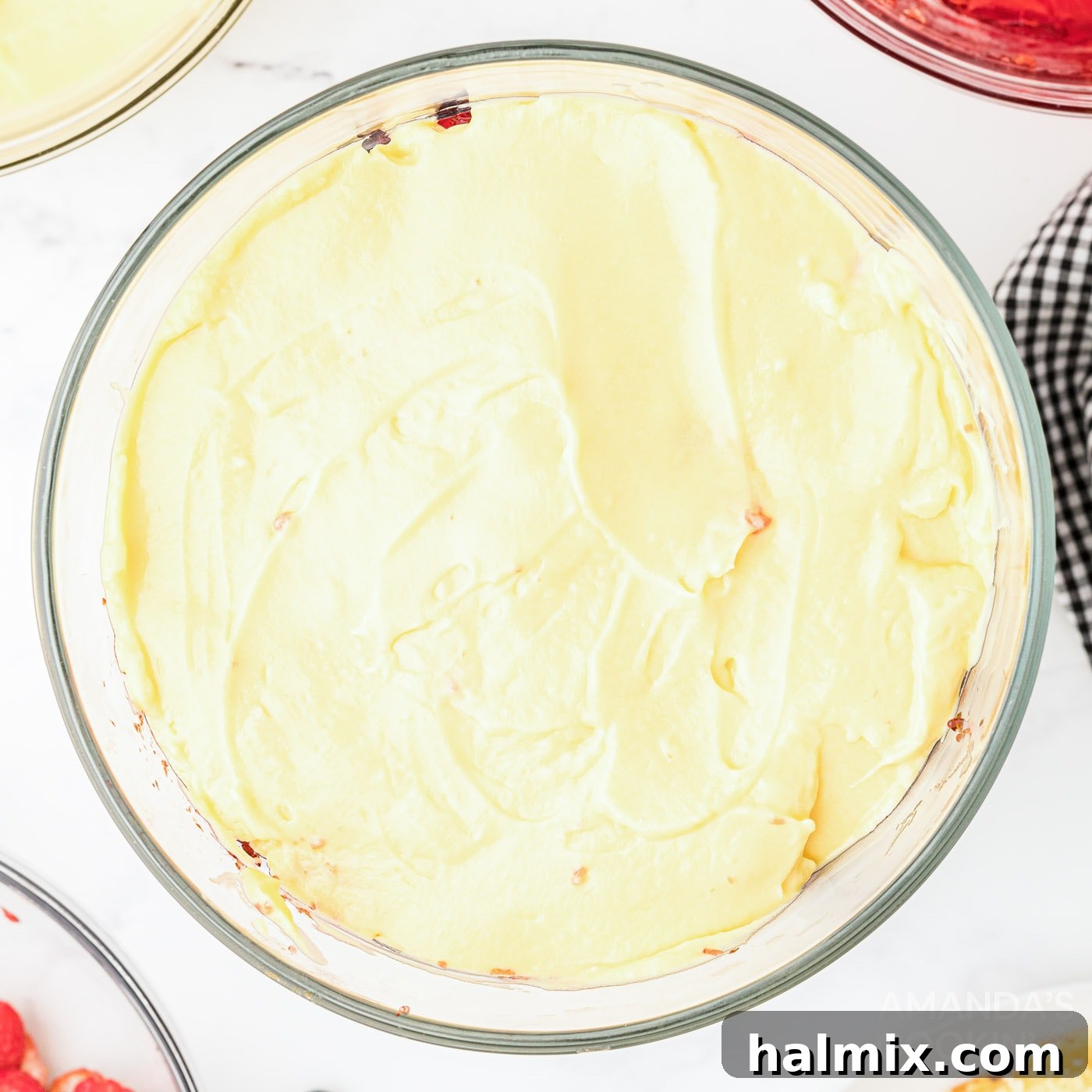Layer of vanilla pudding in a trifle bowl