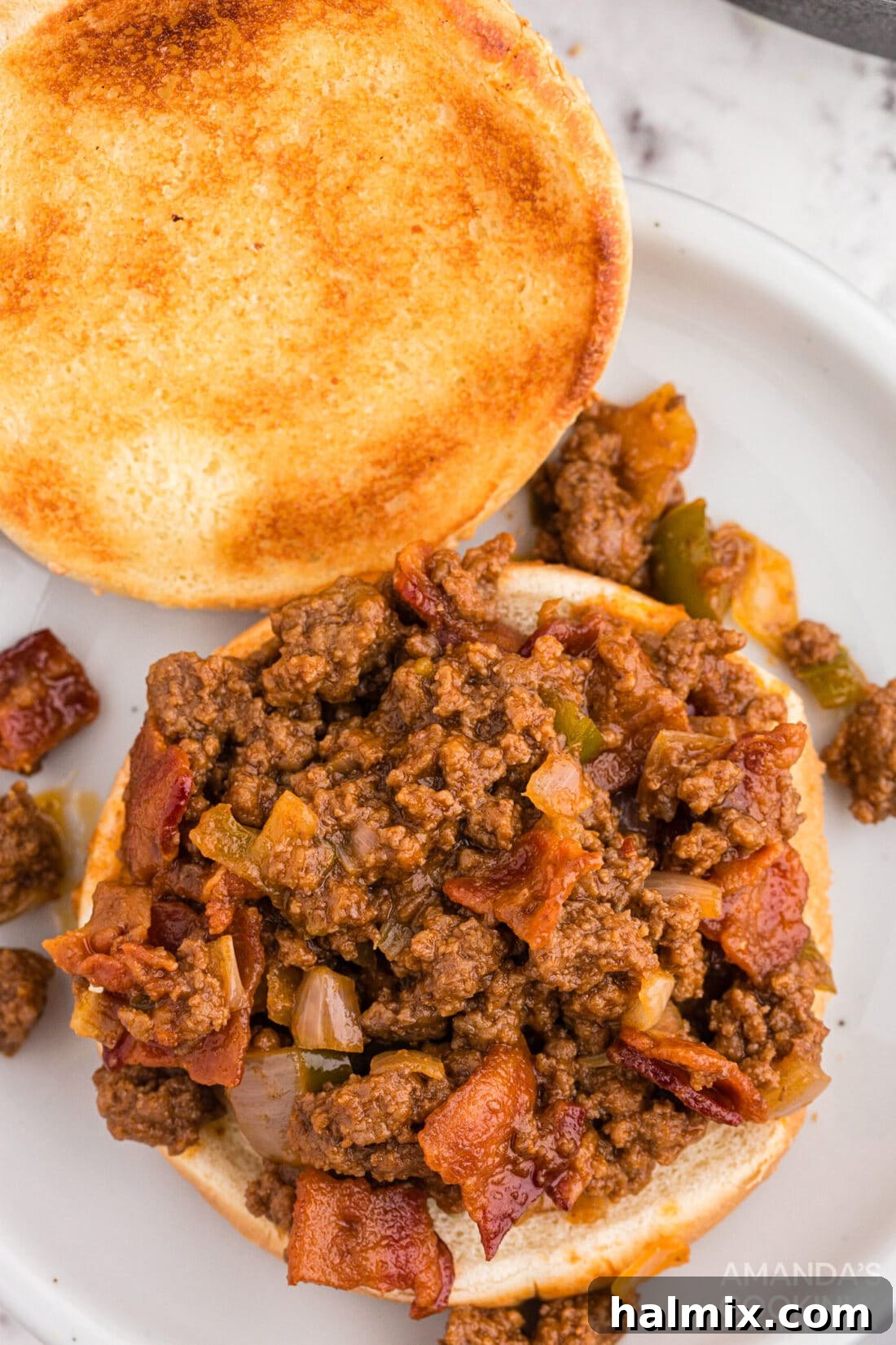 A Bacon Sloppy Joe served on a bottom bun, showcasing the rich filling