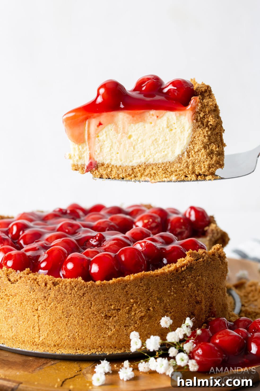 slice of cherry cheesecake on spatula