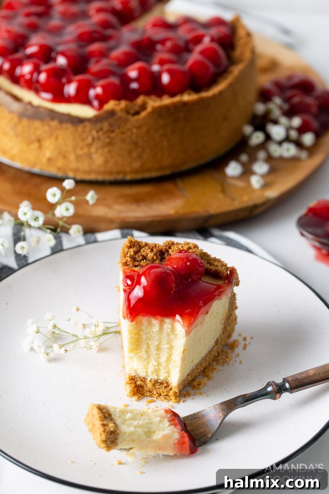 slice of instant pot cherry cheesecake with fork slice removed