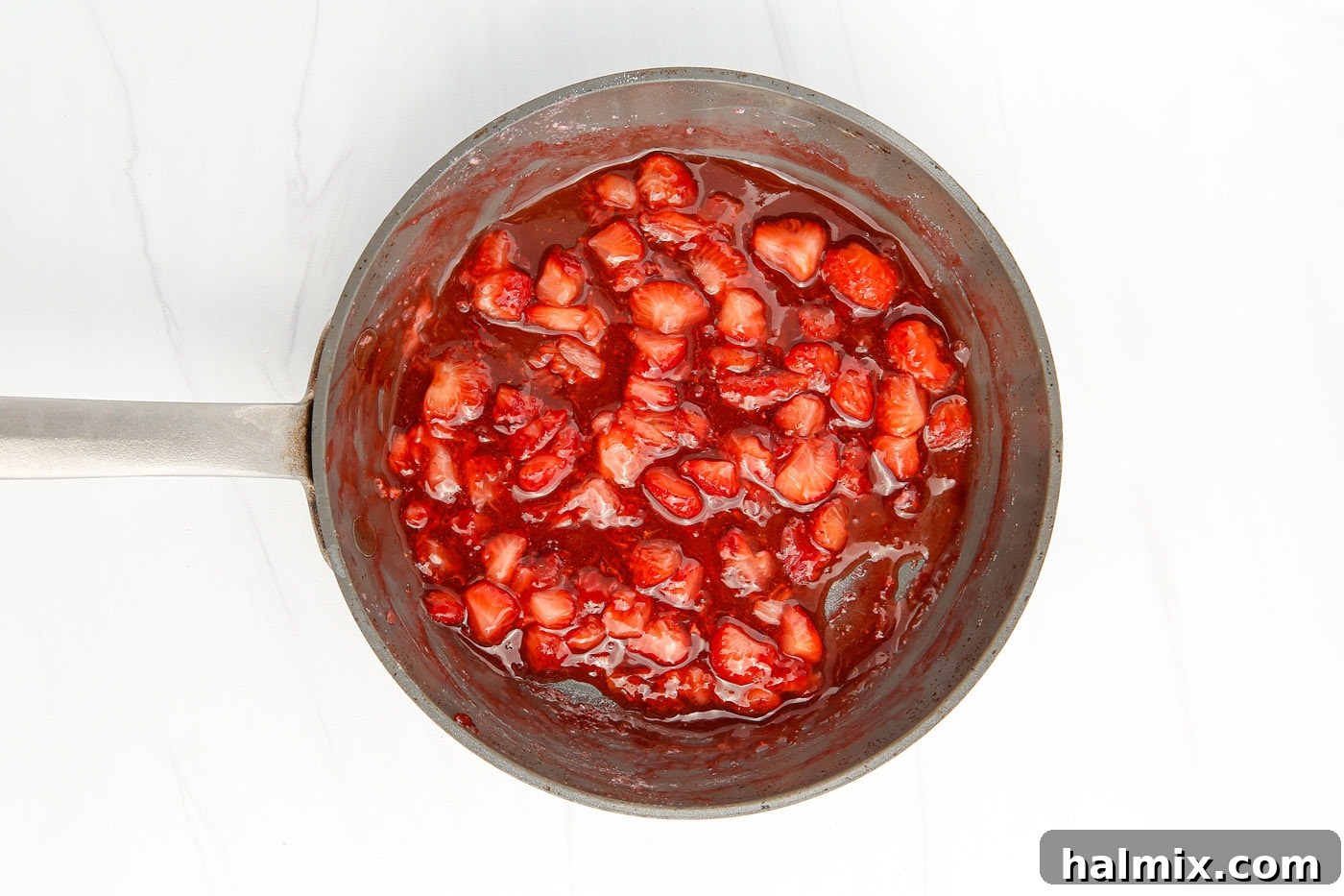 strawberry sauce in a saucepan