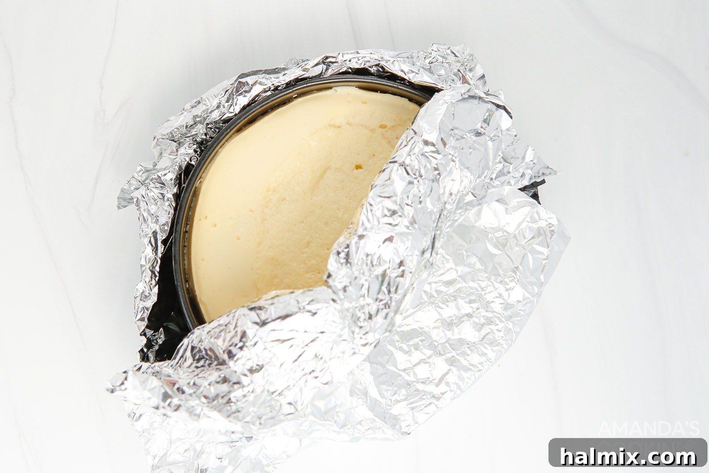 cheesecake wrapped in aluminum foil