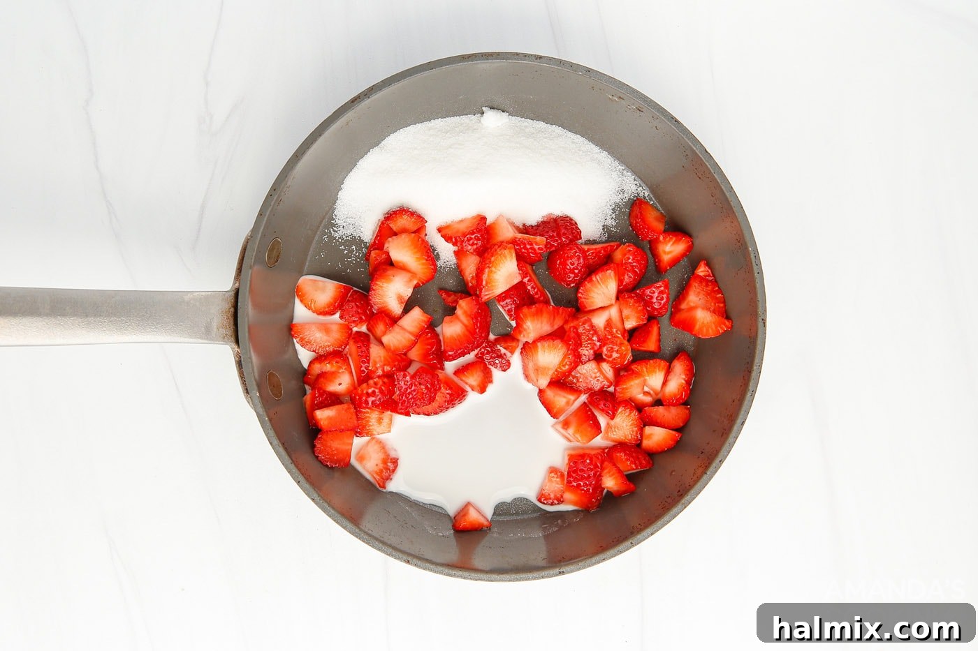 strawberries with sugar and cornstarch in a bowl