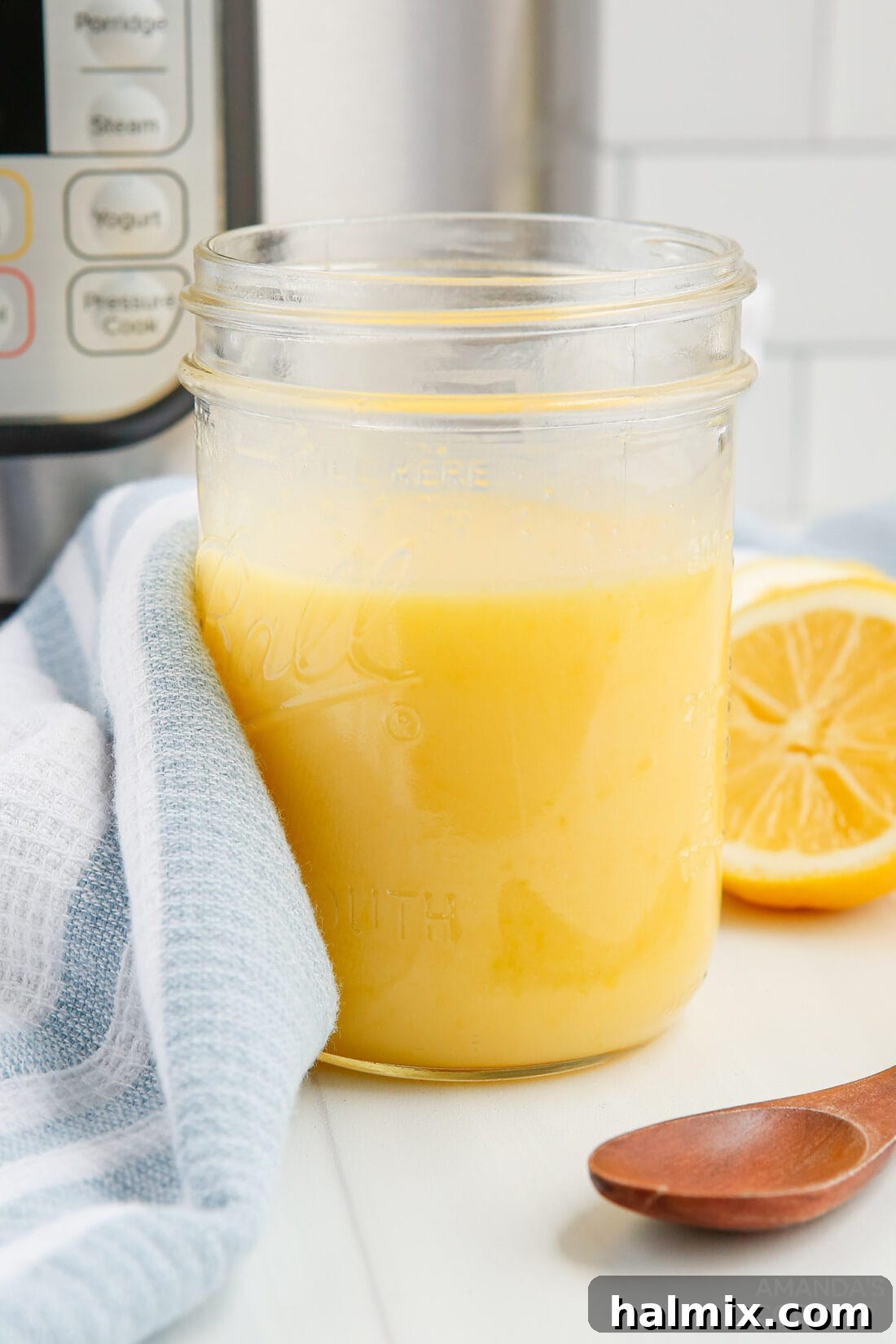 jar of bright yellow Instant Pot lemon curd
