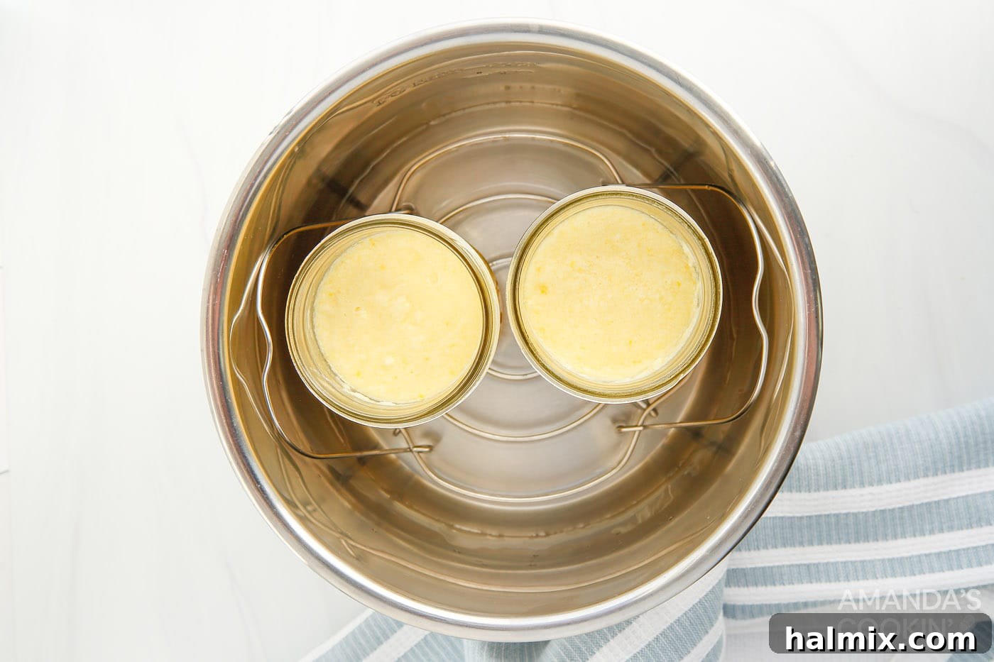 mason jars with lemon curd in instant pot trivet