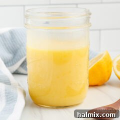 jar of bright yellow Instant Pot lemon curd