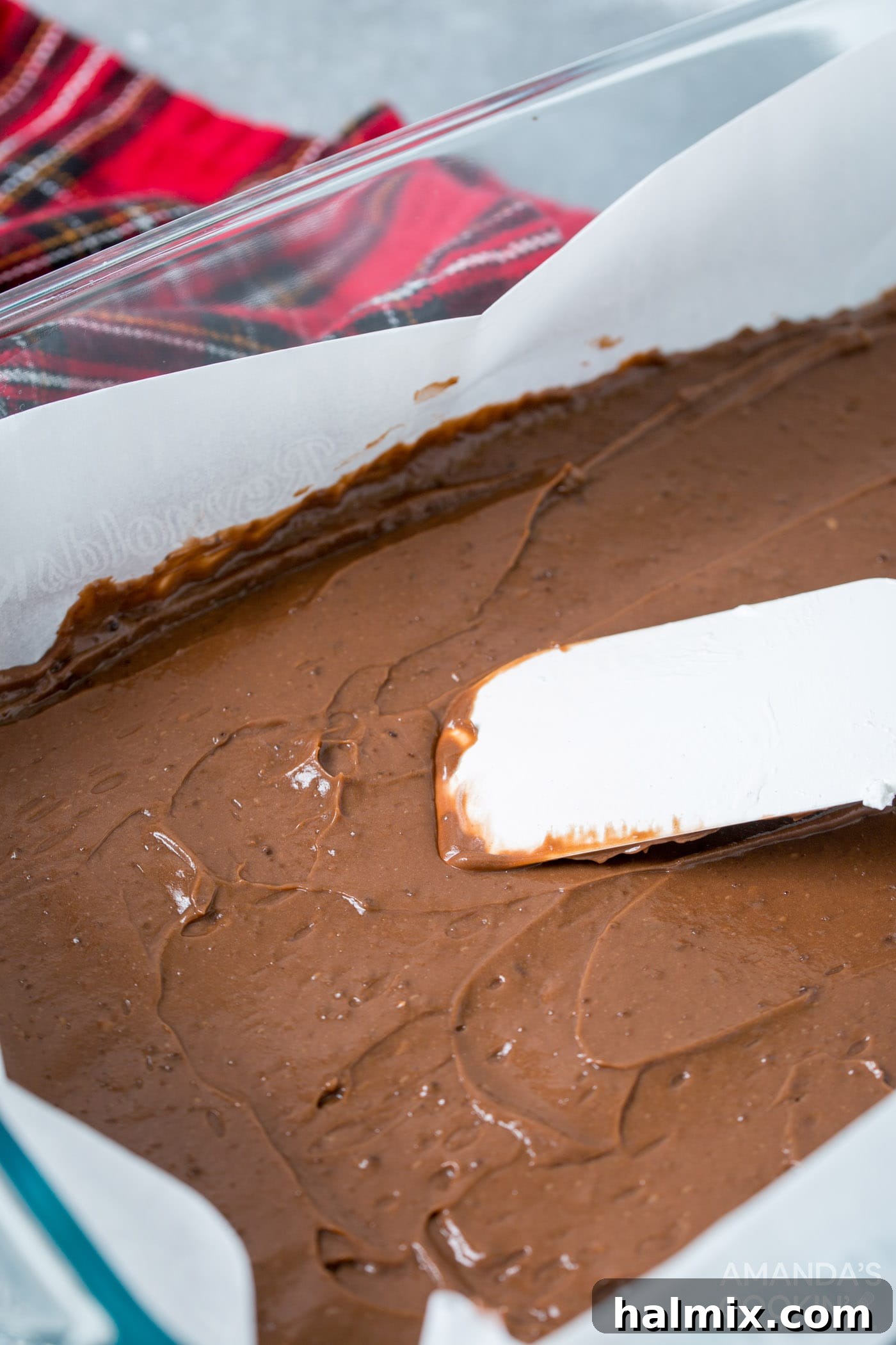 Frosty S'mores 6 rubber spatula smoothing chocolate pudding into pan