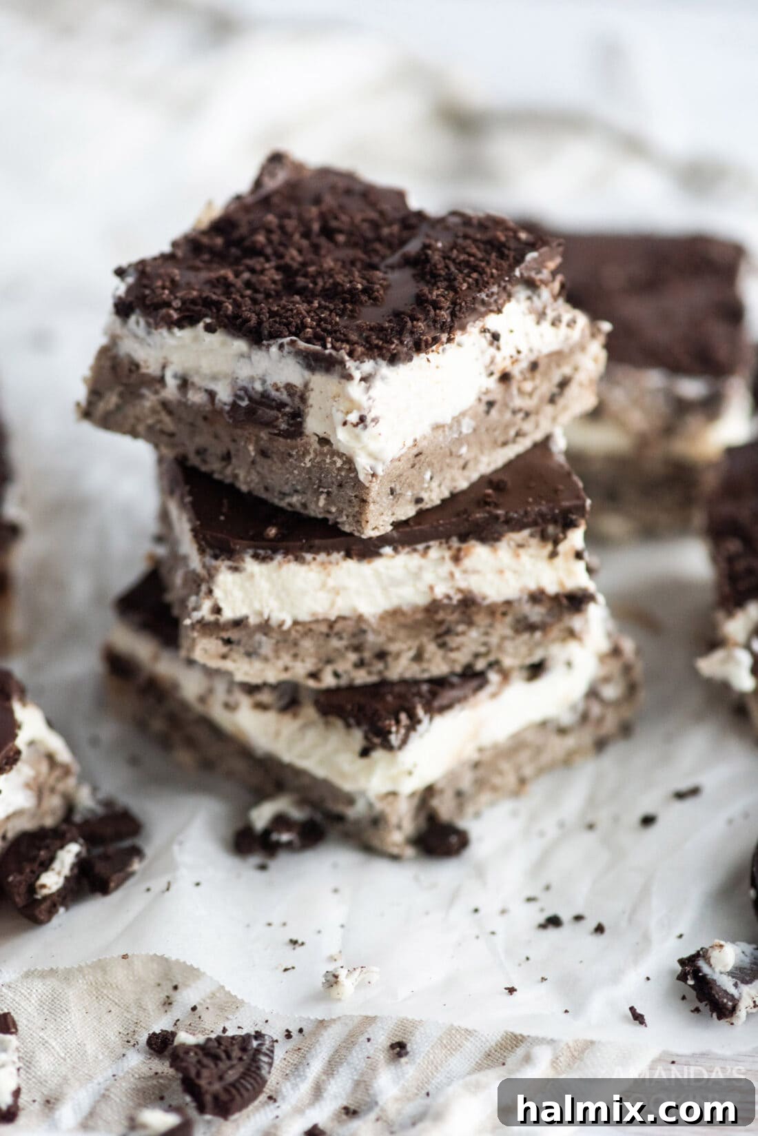 Stack of freshly cut Oreo cheesecake bars