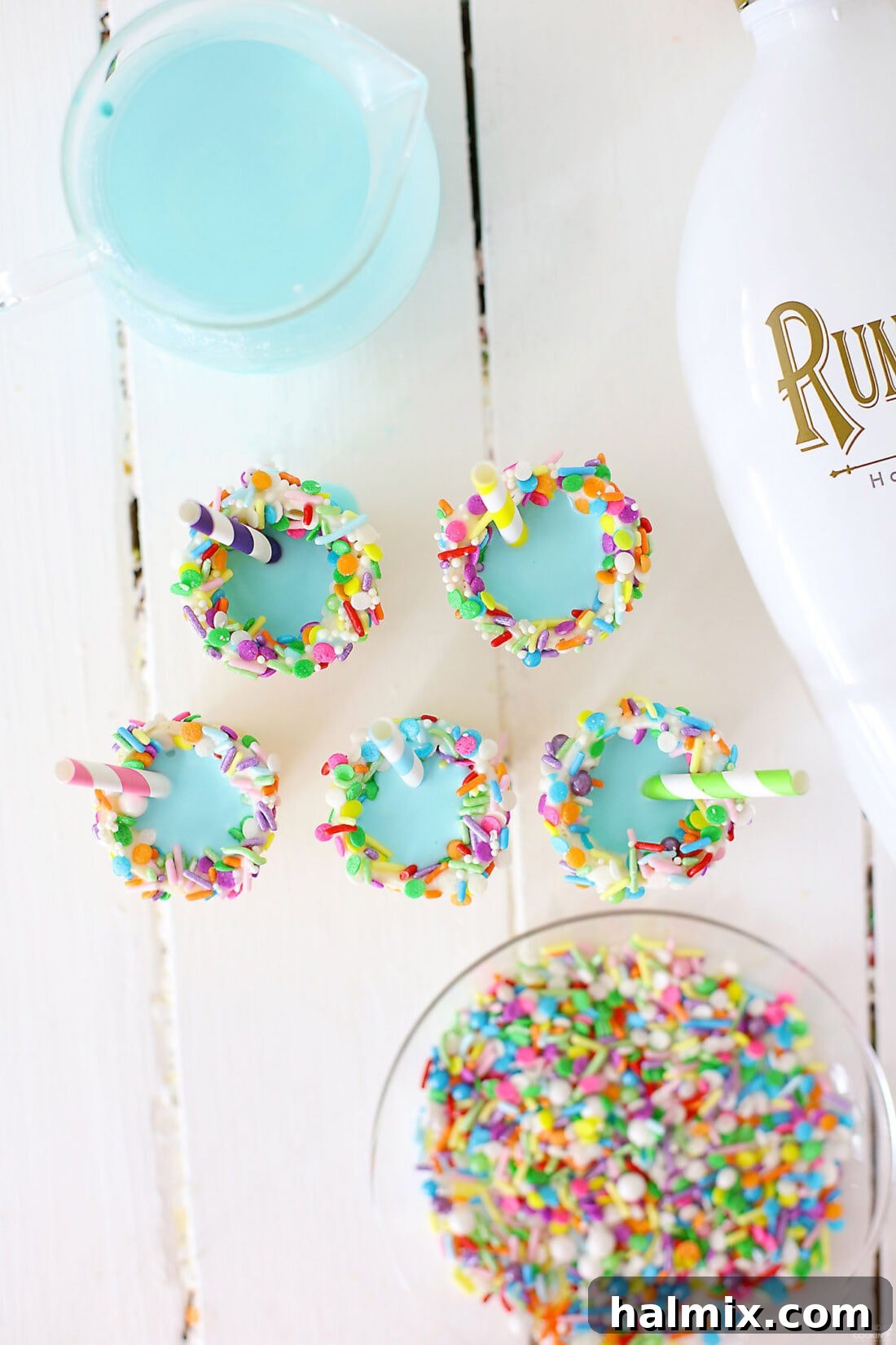 Overhead view of several Ice Cream Cone Rum Chata Shots in different colors