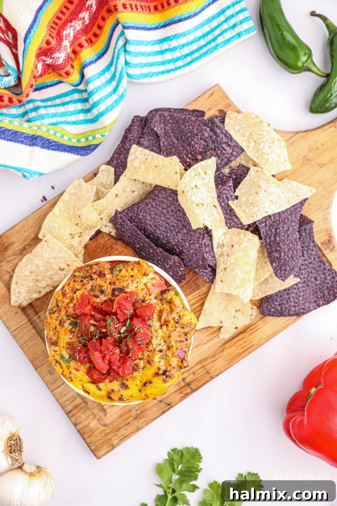 Smoky Cheese Dip 3 Smoked Queso Dip in bowl with chips