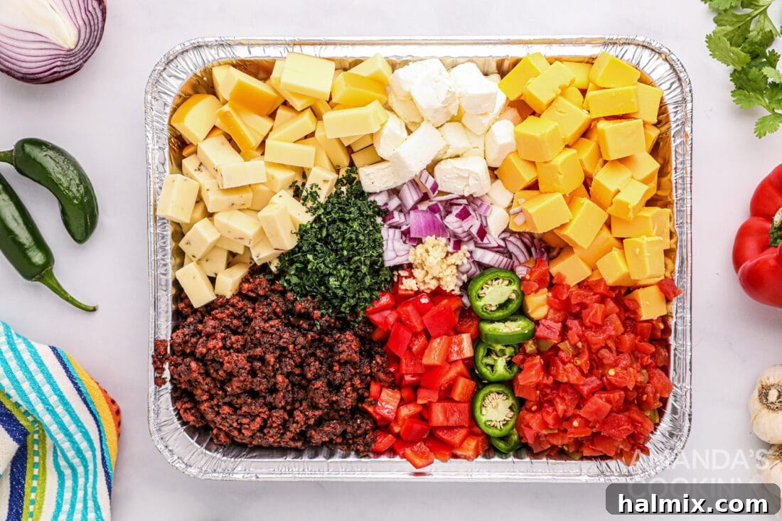 Smoky Cheese Dip 4 ingredients for Smoked Queso Dip in foil pan