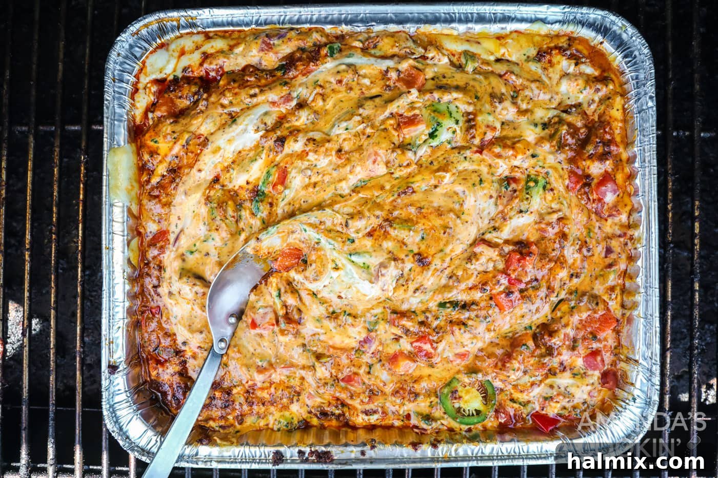 Smoky Cheese Dip 6 finished smoked queso dip in a pan inspired by tik tok