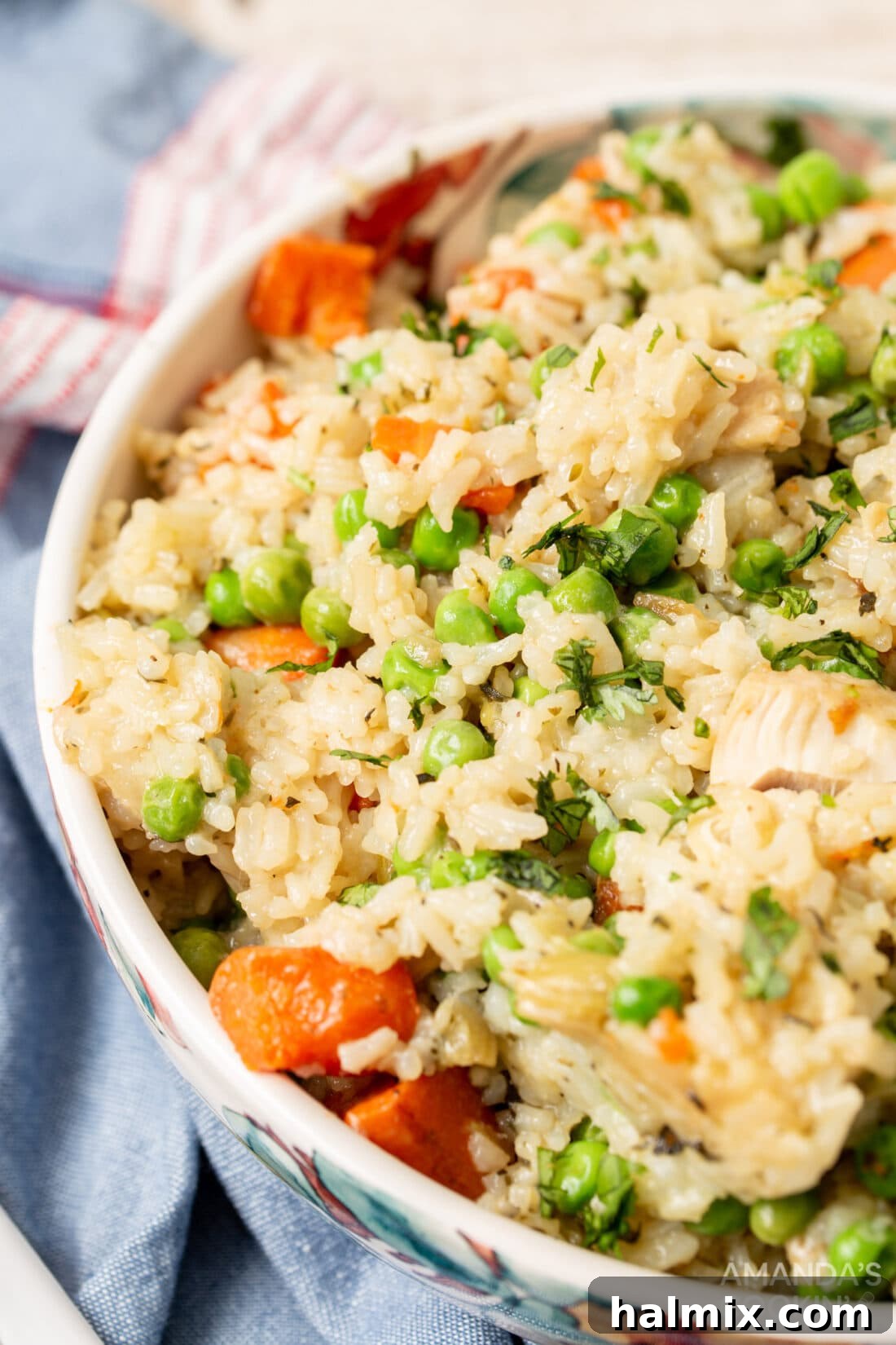 Easy Instant Pot Chicken and Rice 3 A beautifully presented bowl of Instant Pot chicken and rice, garnished with fresh herbs, ready to be enjoyed.