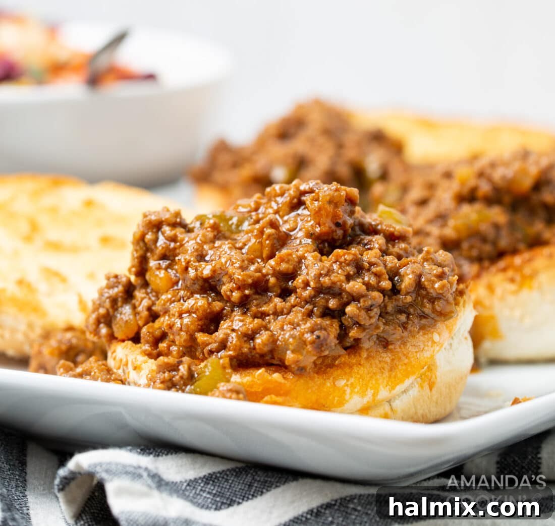 Lightning-Fast Instant Pot Sloppy Joes 8 open face Instant Pot Sloppy Joe on a toasted bun