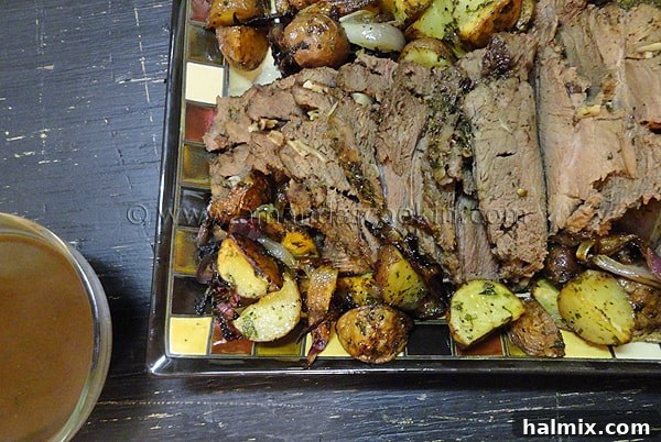 An overhead photo of a serving of perfect Sunday roast on a plate.