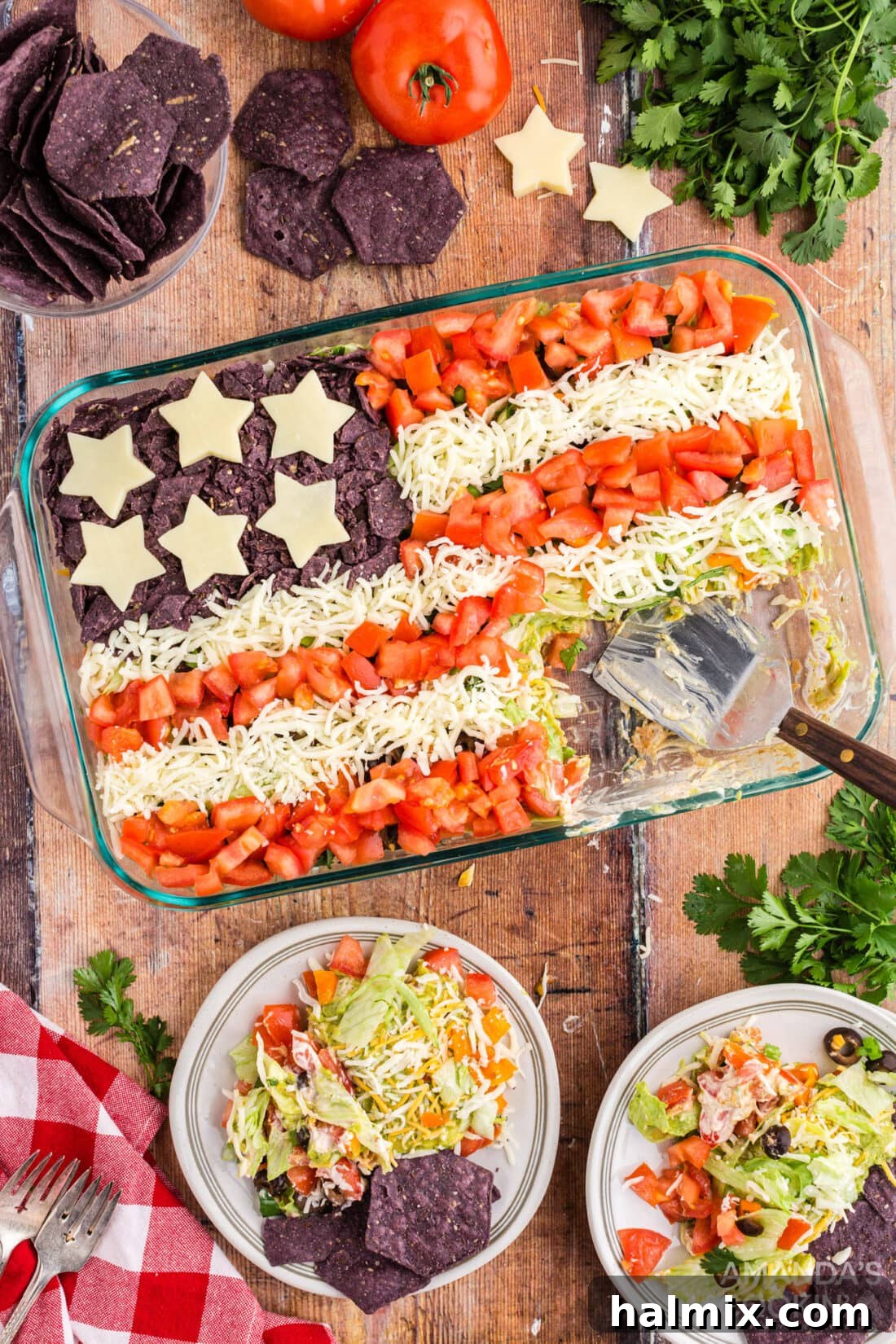 Taco salad designed like an American flag, perfect for Fourth of July celebrations.