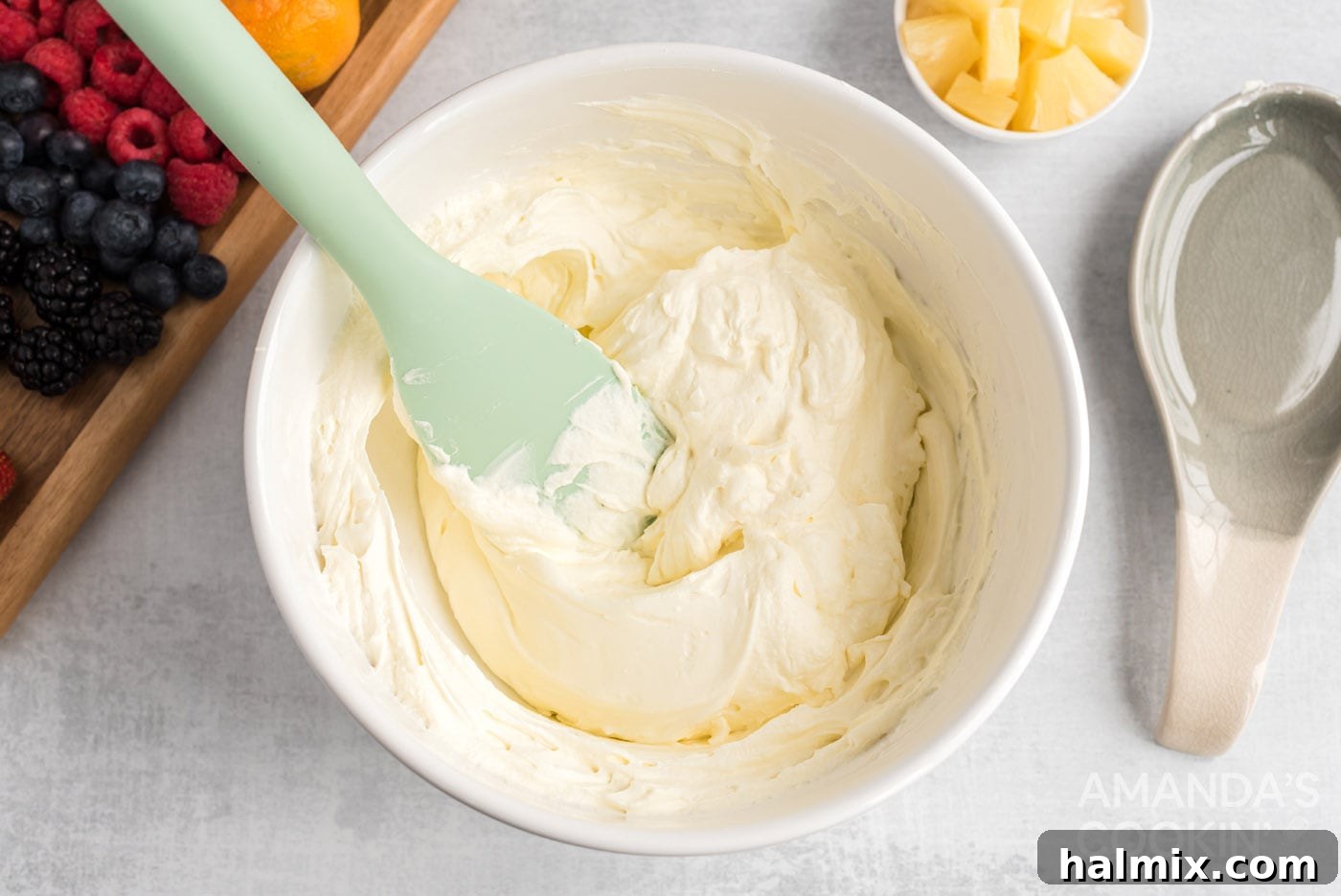 Crimson Crust Pizza 7 rubber spatula folding in whipped topping to cream cheese mixture