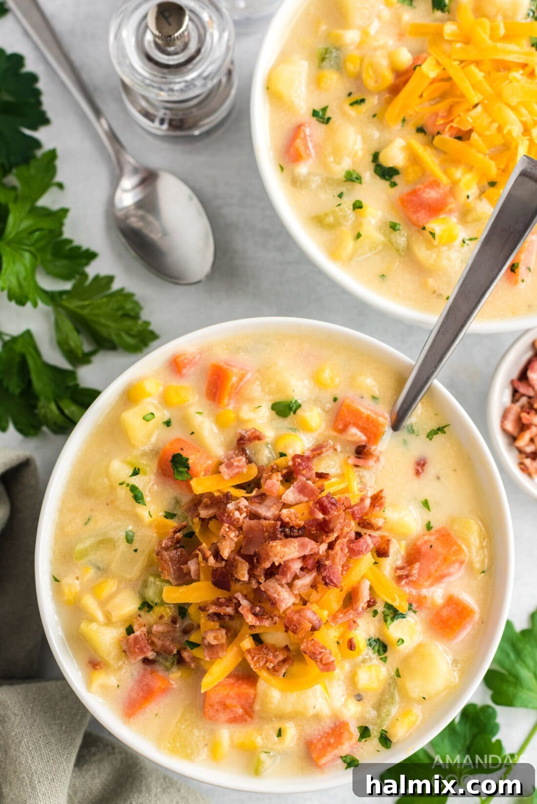 Sweet Corn Comfort 2 A comforting bowl of simple corn chowder garnished with fresh herbs