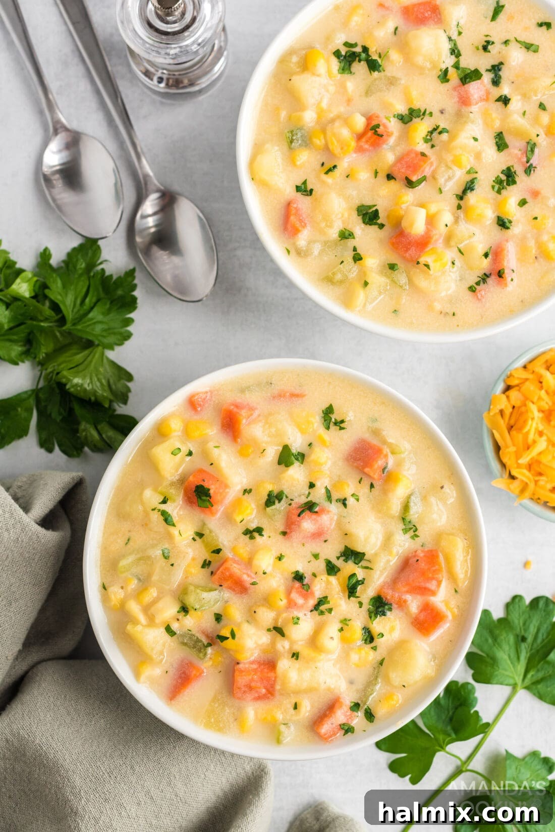 Sweet Corn Comfort 10 Two bowls of creamy corn chowder, ready to be served