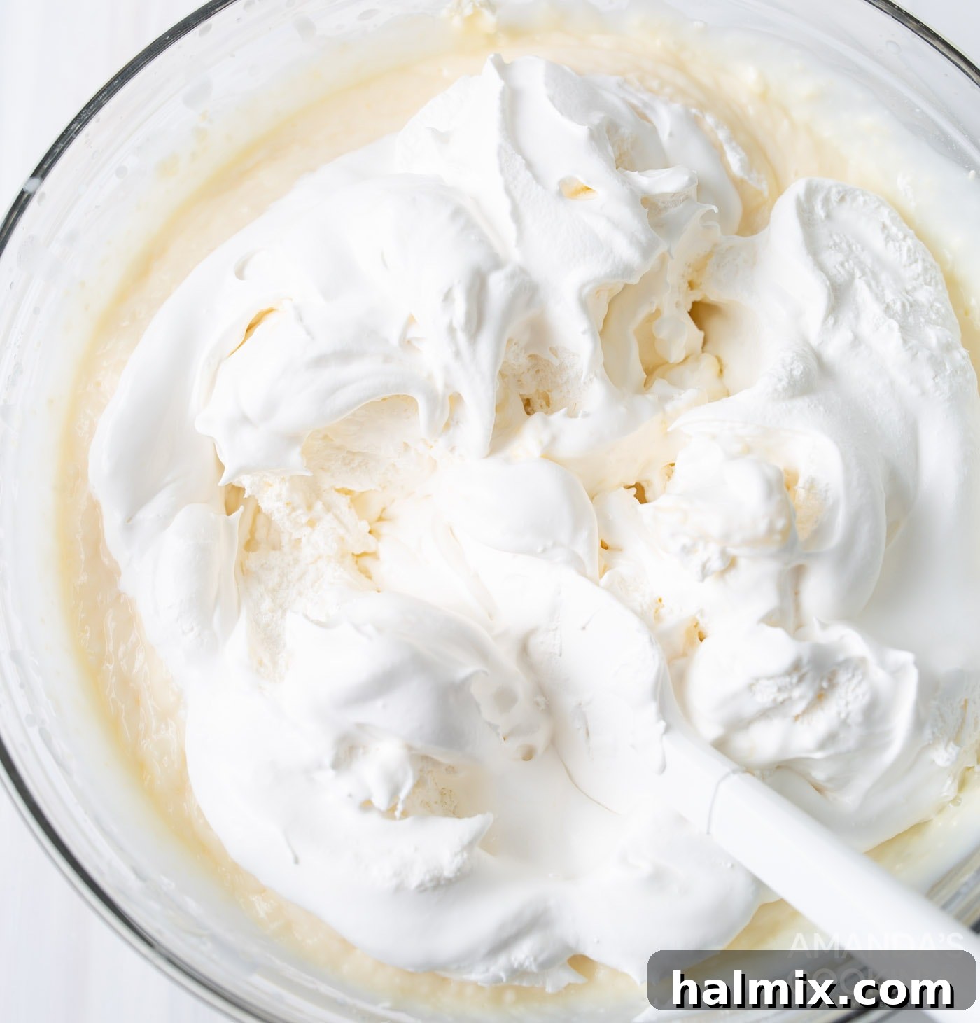 Rainbow No-Bake Dream 5 vanilla pudding, cream cheese, and cool whip in a mixing bowl