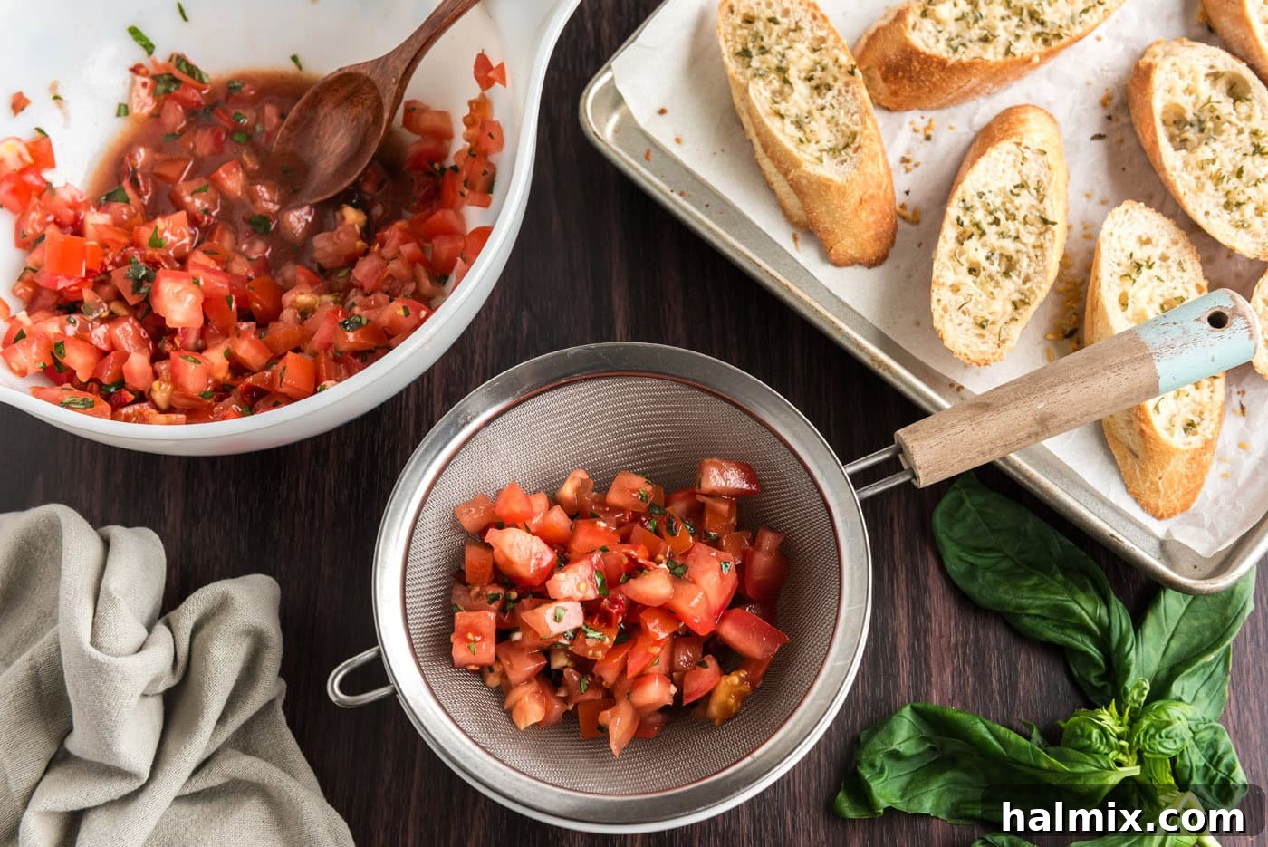 draining bruschetta tomato mixture