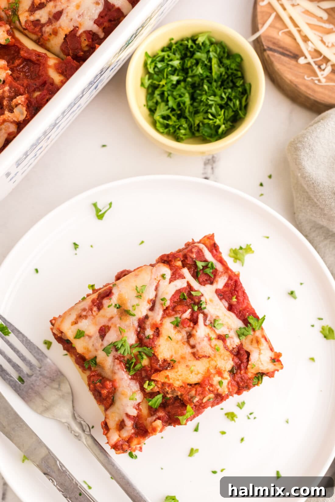 Savory Lasagna Spirals 3 overhead photo of Lasagna Roll Up on a plate