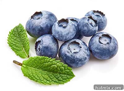 A bowl of fresh, plump blueberries.