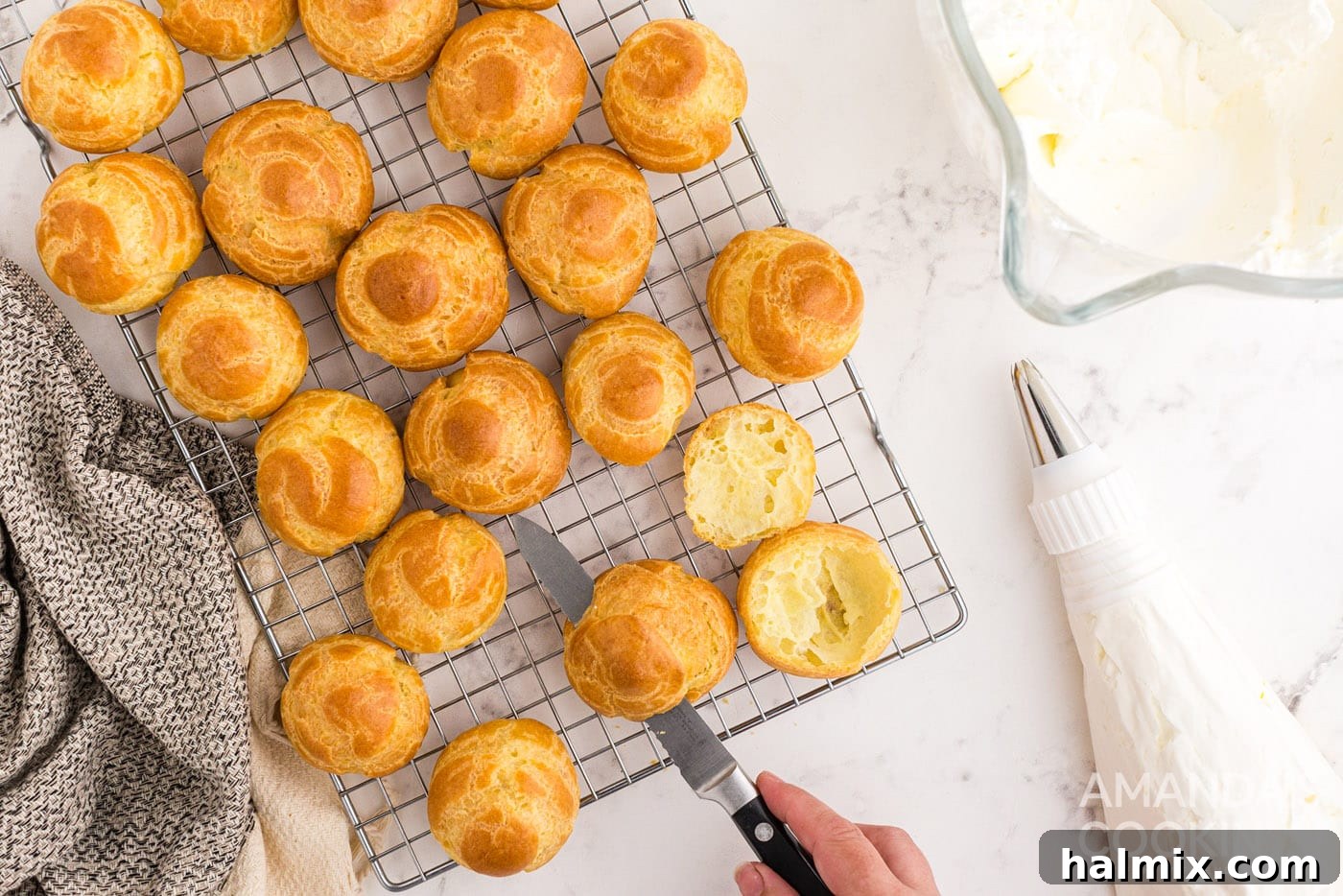 Puffy Cream Delights 11 cream puffs on cooling rack