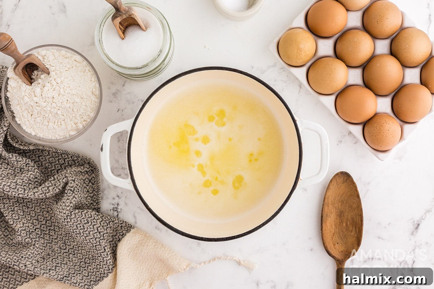Puffy Cream Delights 5 butter, water, salt, and sugar in saucepan