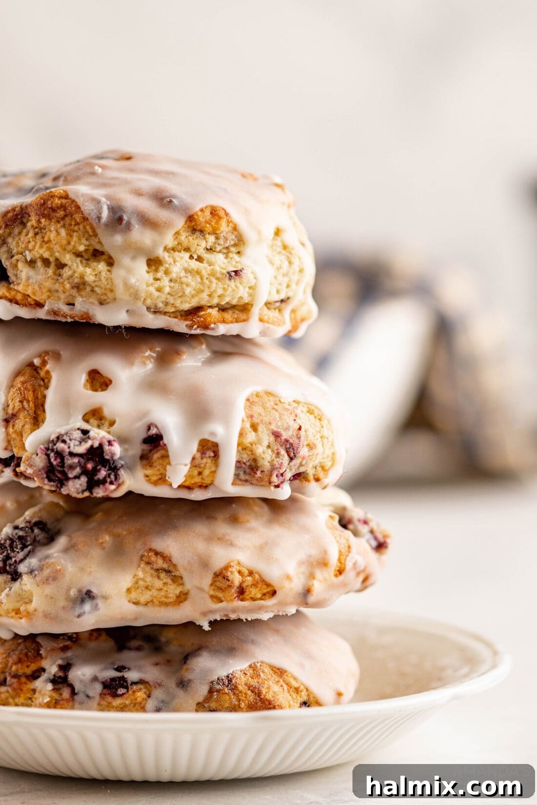Divine Blackberry Scones 2 stack of Blackberry Scones with a light glaze