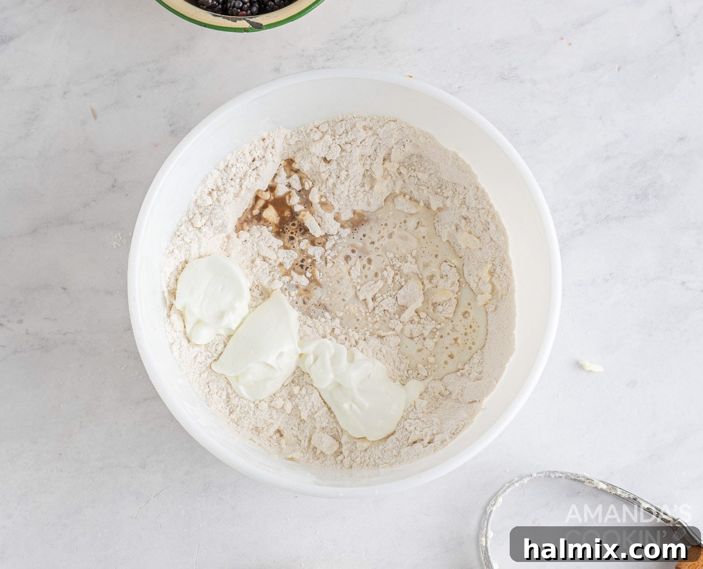 Divine Blackberry Scones 6 buttermilk, yogurt, and vanilla in flour mixture
