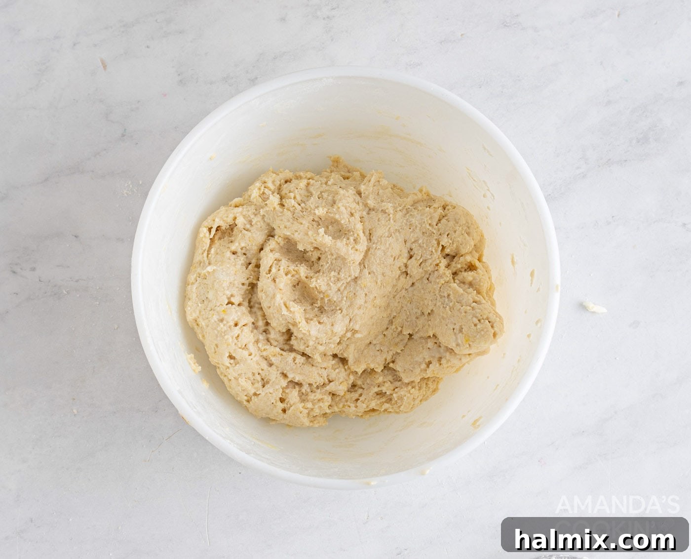 Divine Blackberry Scones 7 egg being incorporated into the scone dough