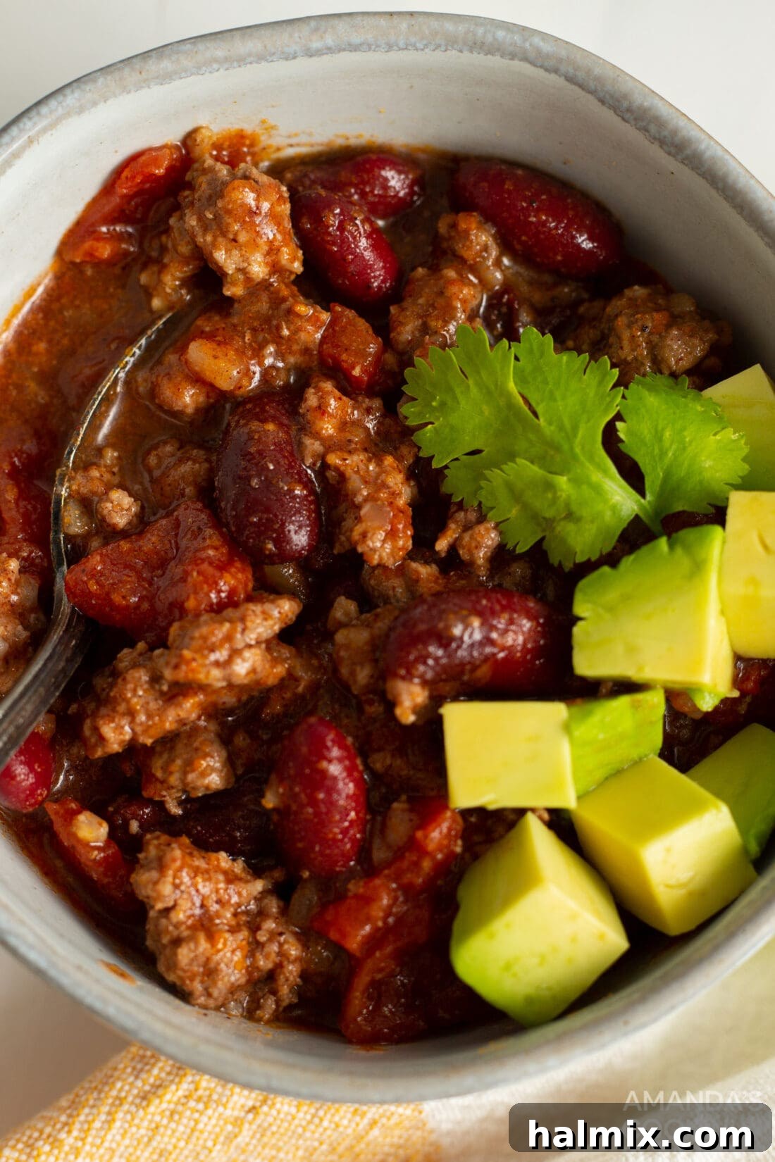 A steaming bowl of Crockpot Chili, ready to be enjoyed.