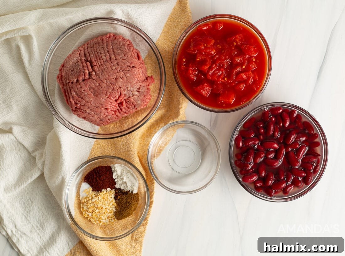 Assortment of fresh and canned ingredients for making Crockpot Chili.