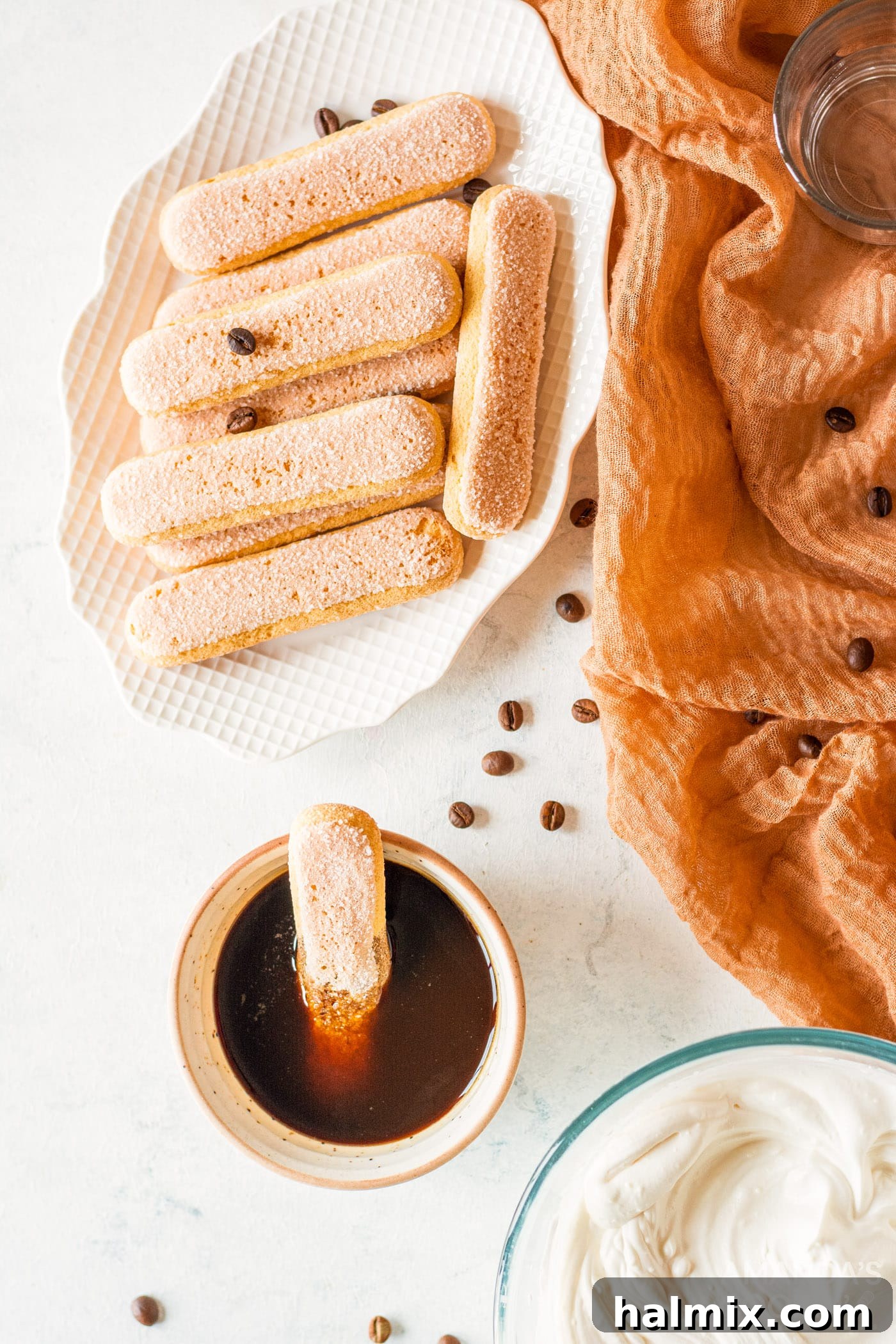 Personal Tiramisu Indulgence 5 Dipping a ladyfinger into coffee.