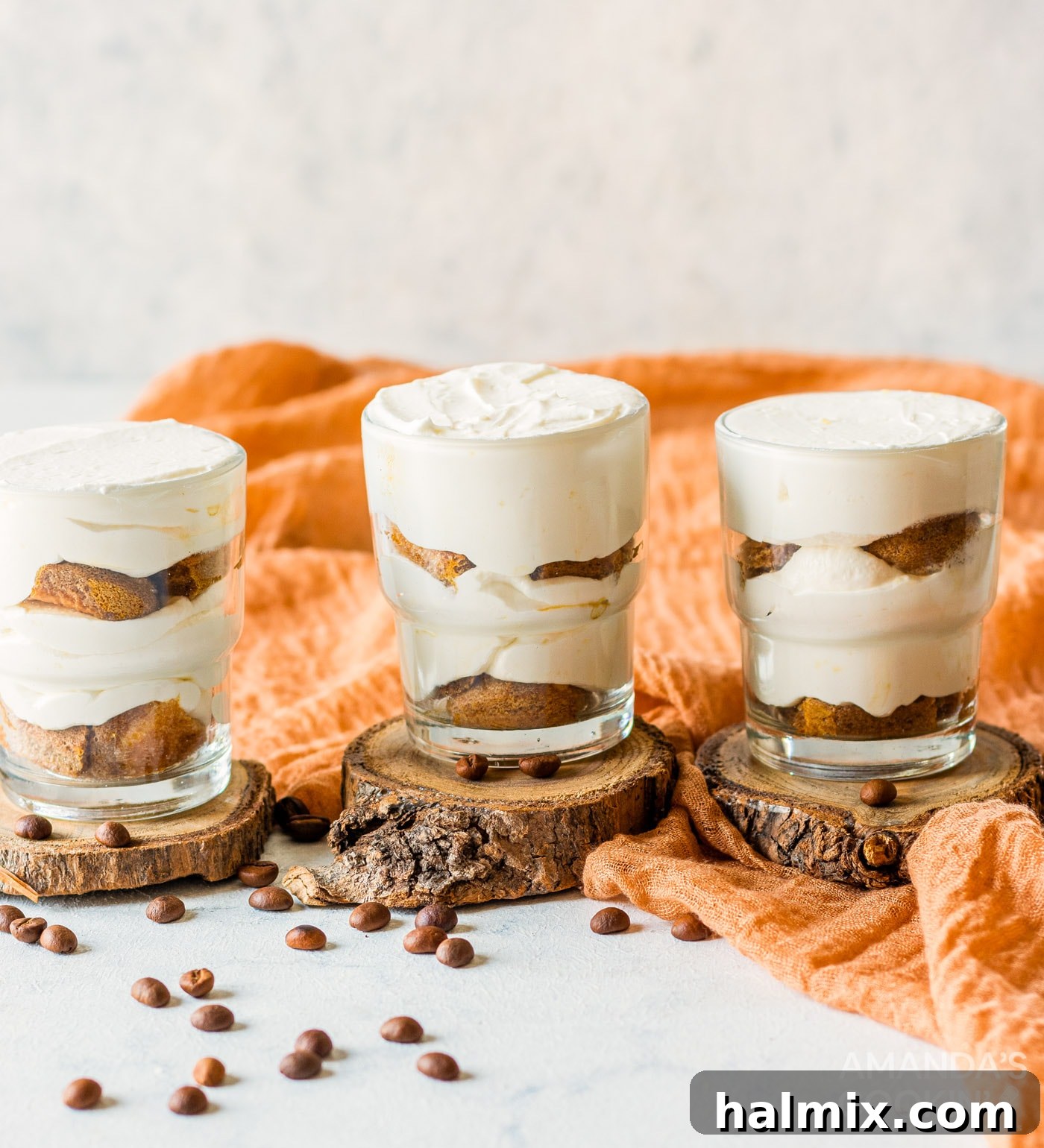 Personal Tiramisu Indulgence 8 Mascarpone cheese mixture with ladyfingers layered in a cup, forming an individual tiramisu.