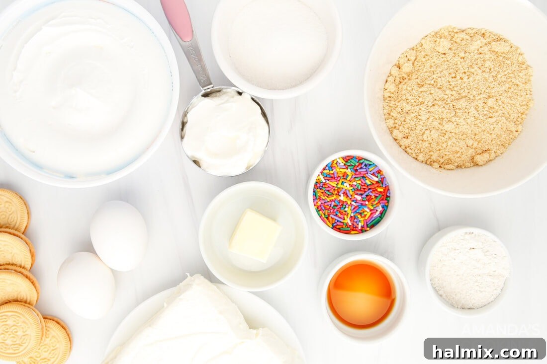 A flat lay of all the essential ingredients laid out for making Instant Pot Funfetti Cheesecake.