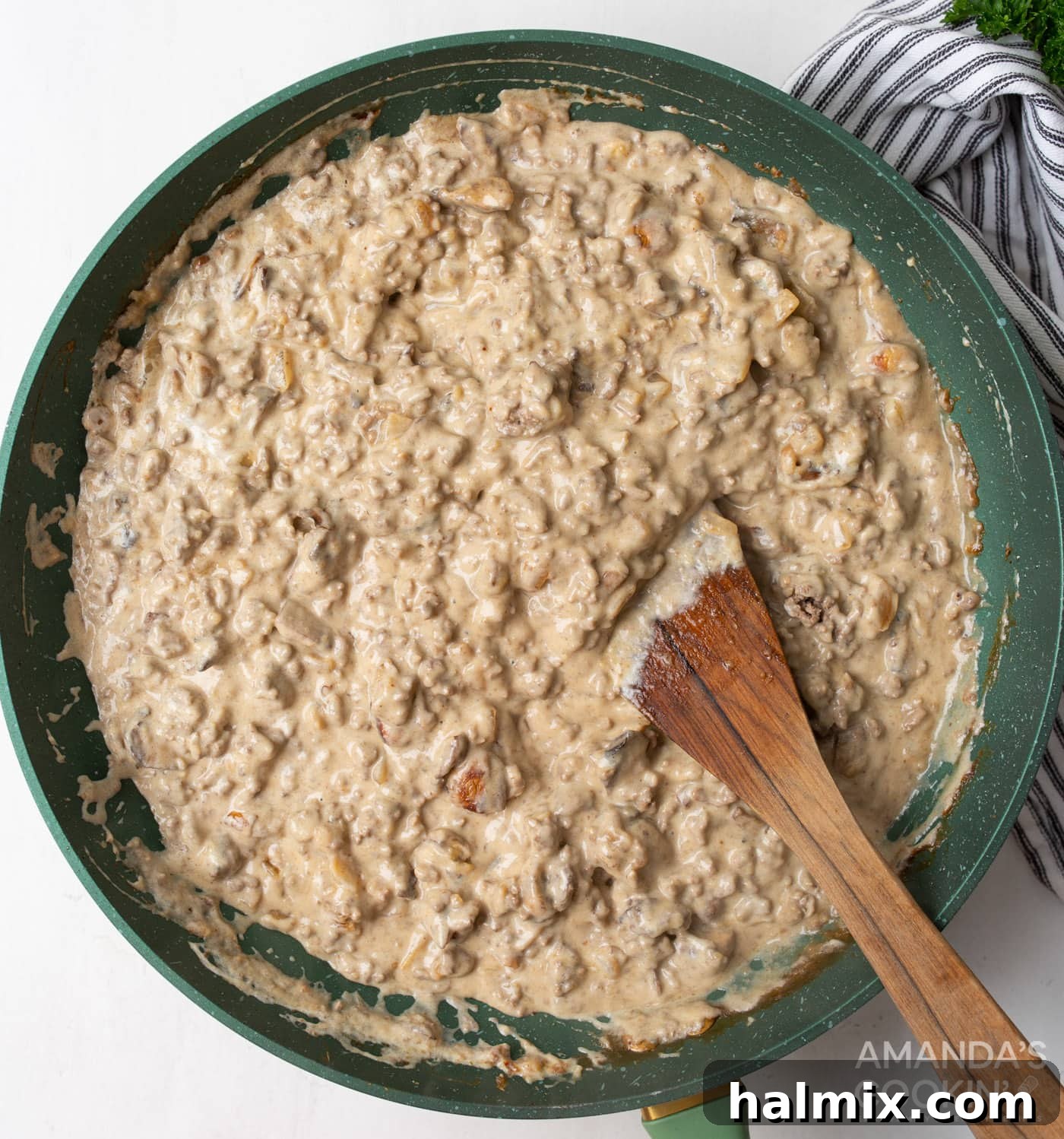 Creamy Beef Noodle Bake 9 The fully combined stroganoff mixture in a skillet, ready to be poured over noodles.