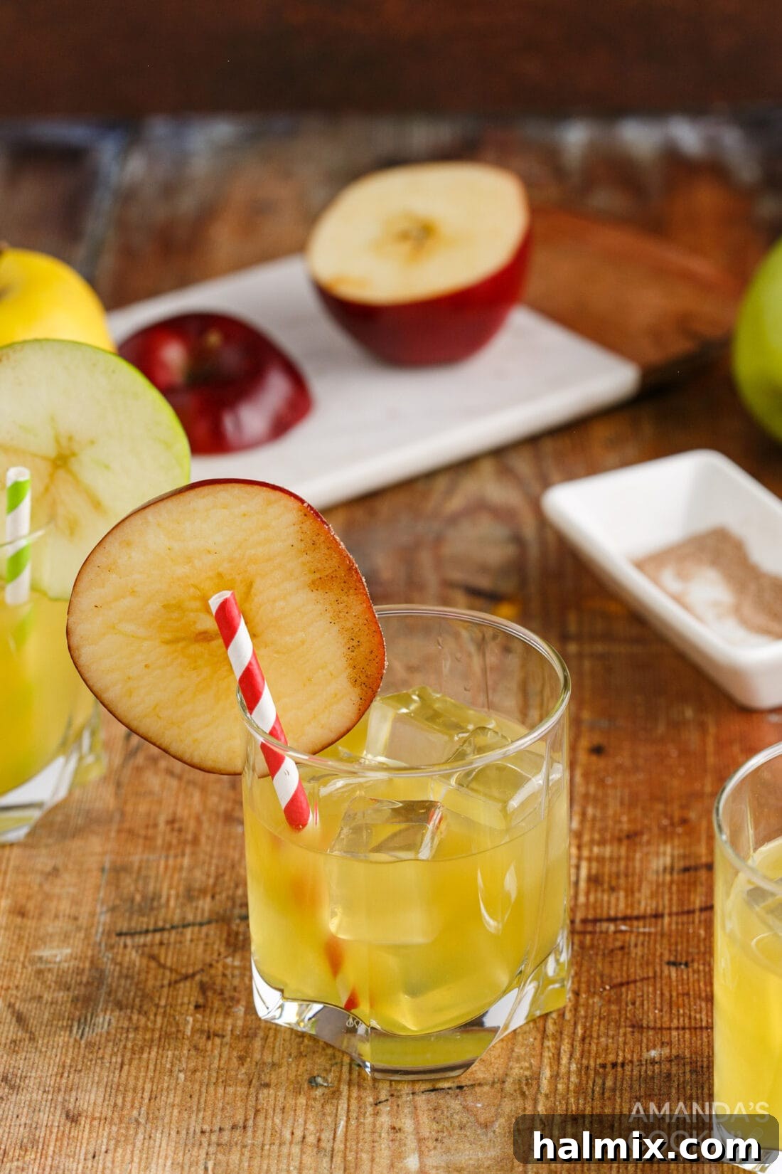 Cinnamon Applesauce Cocktail with cutting board in background