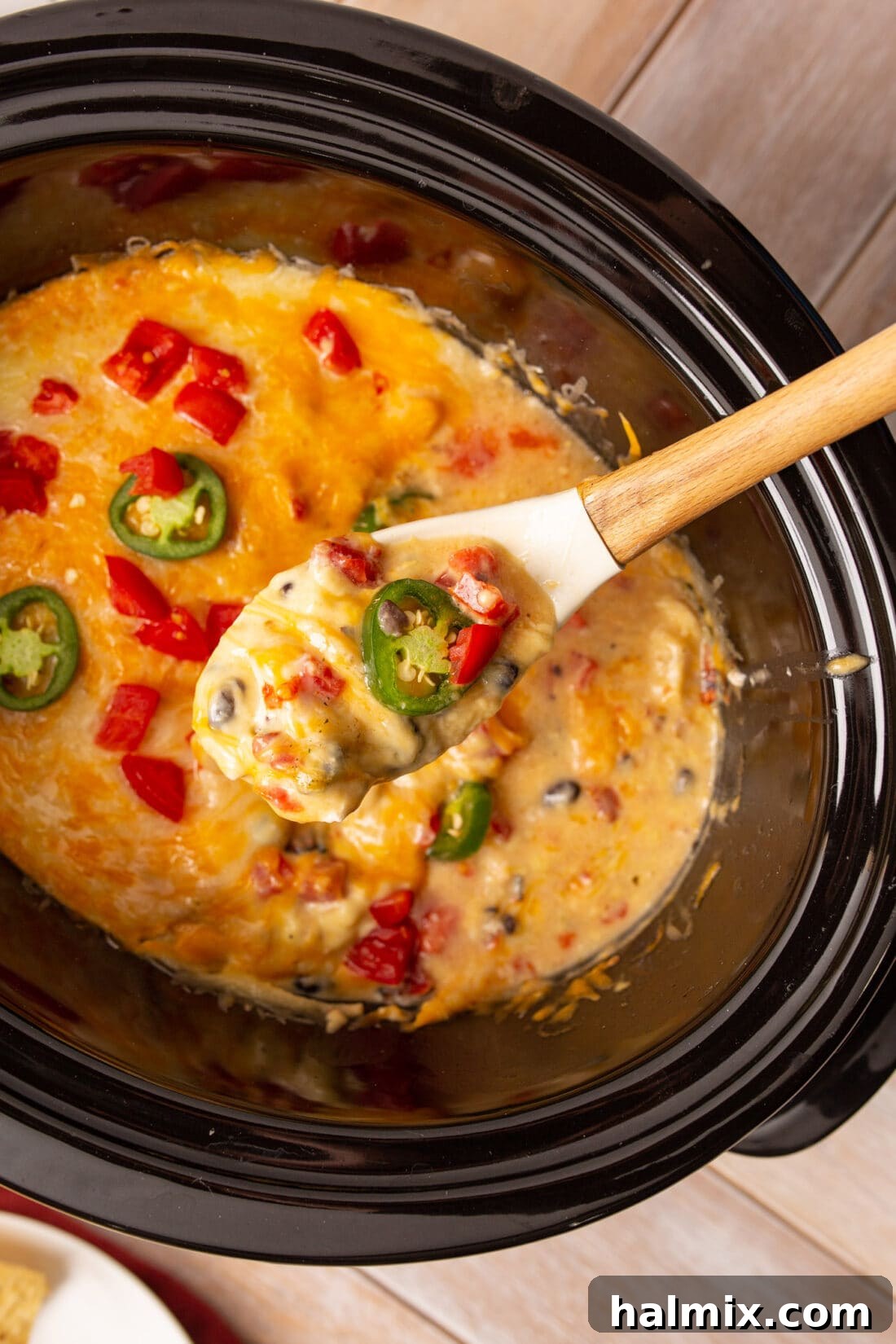 Slow Cooker Fiesta Chicken 2 serving spoon of crockpot mexican chicken