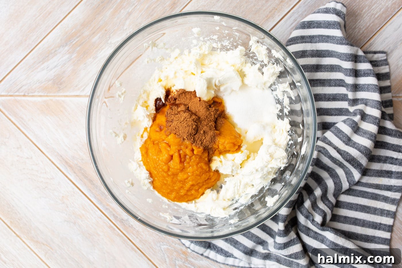 cream cheese, pumpkin puree, pie spice and vanilla in a mixing bowl