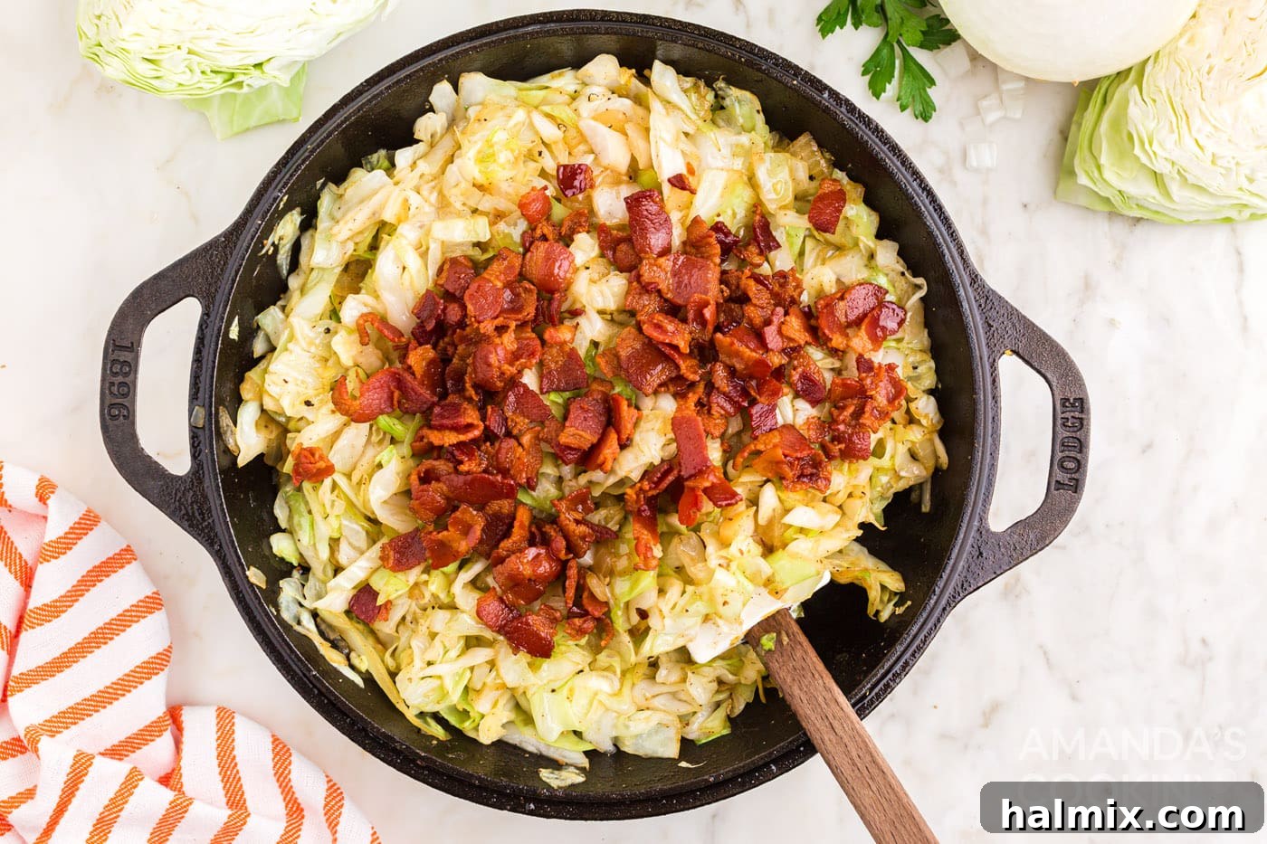 chopped bacon in a skillet with cabbage