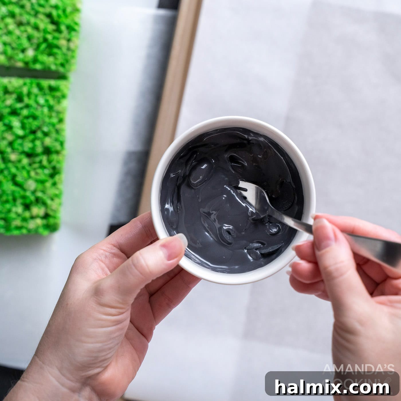 Frankenstein's Krispie Creations 12 Stirring melted black candy melts